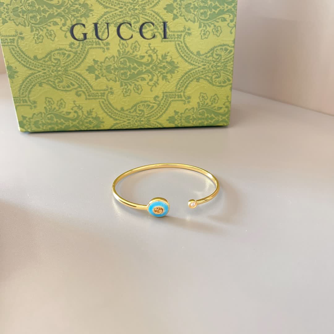 Gucci Gold Tone Blue Enamel Evil Eye Bracelet