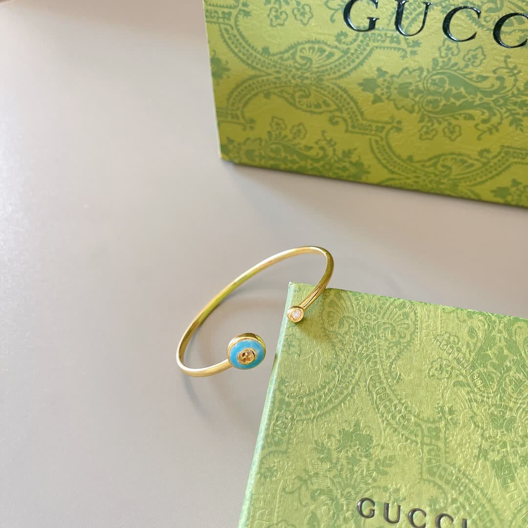 Gucci Gold Tone Blue Enamel Evil Eye Bracelet