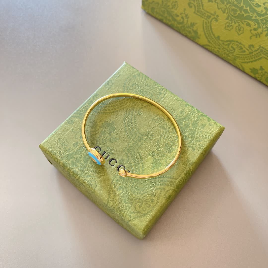 Gucci Gold Tone Blue Enamel Evil Eye Bracelet