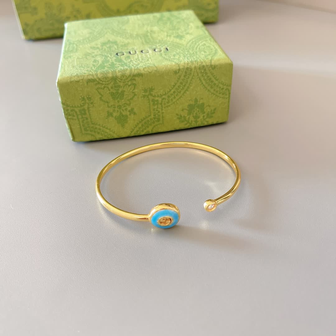 Gucci Gold Tone Blue Enamel Evil Eye Bracelet