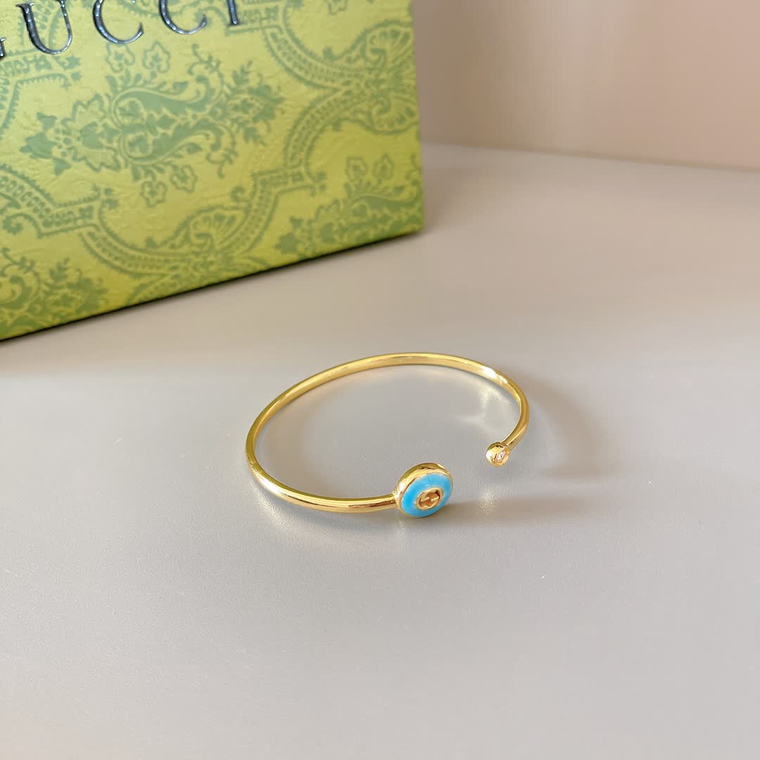 Gucci Gold Tone Blue Enamel Evil Eye Bracelet