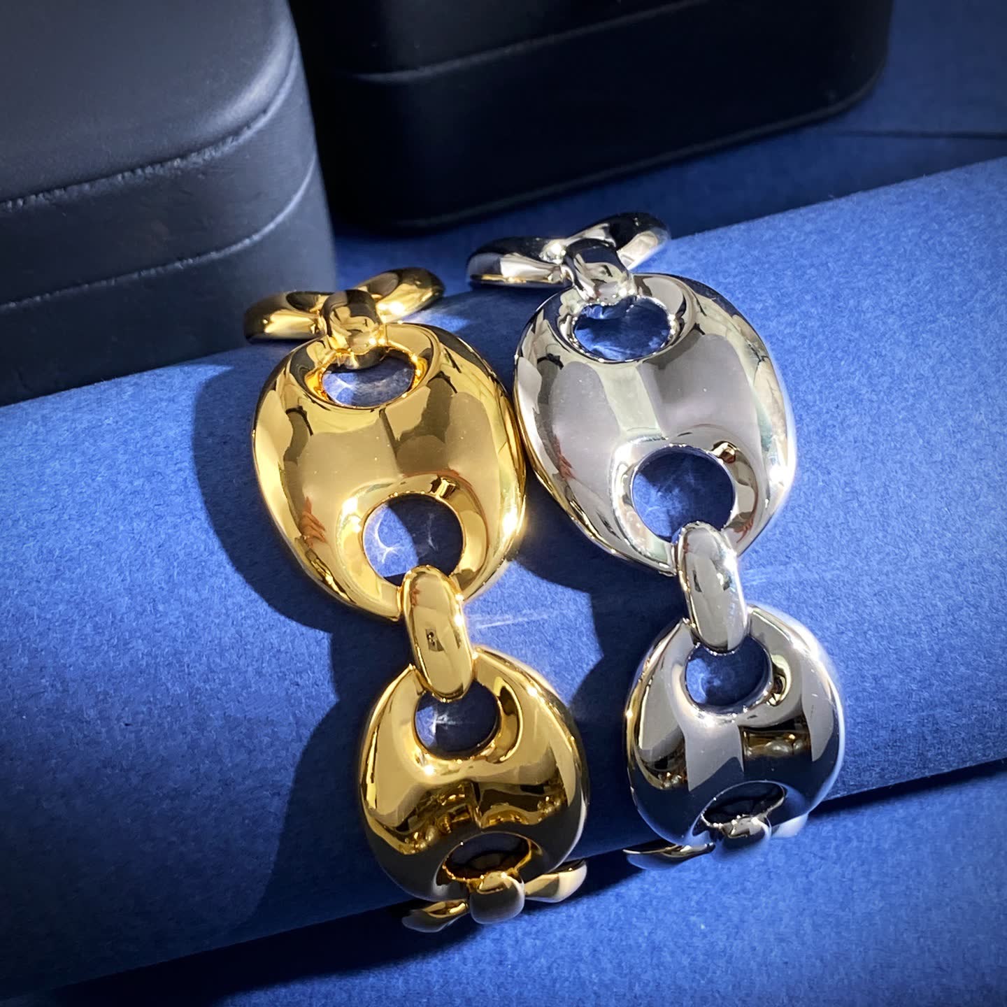 Gucci Elegant Gold and Silver Bracelets with Blue Stones