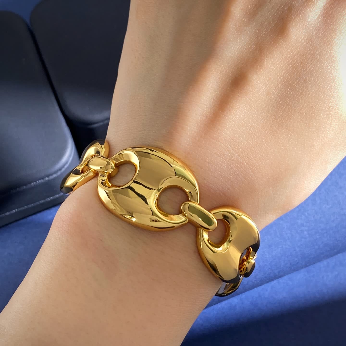 Gucci Elegant Gold and Silver Bracelets with Blue Stones