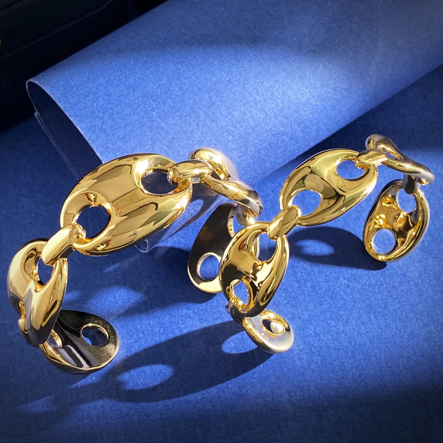 Gucci Elegant Gold and Silver Bracelets with Blue Stones
