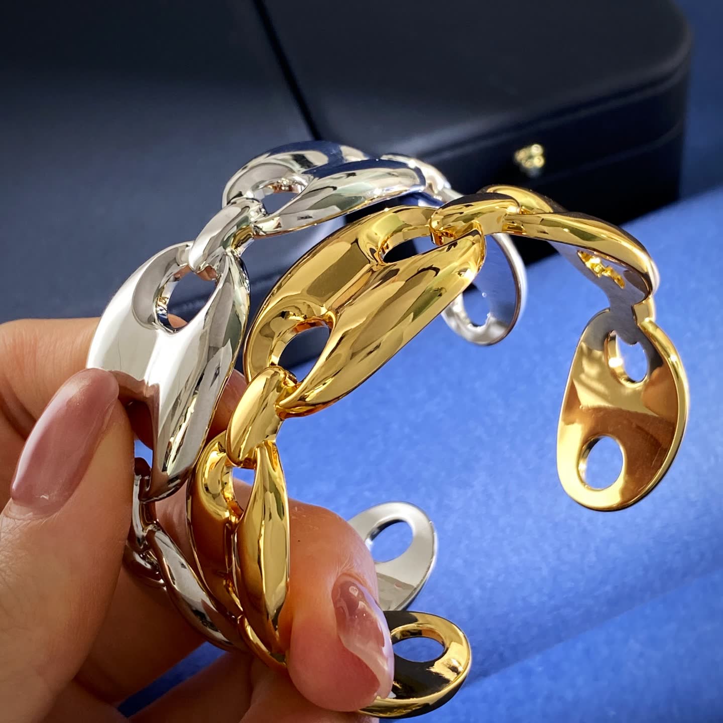 Gucci Elegant Gold and Silver Bracelets with Blue Stones