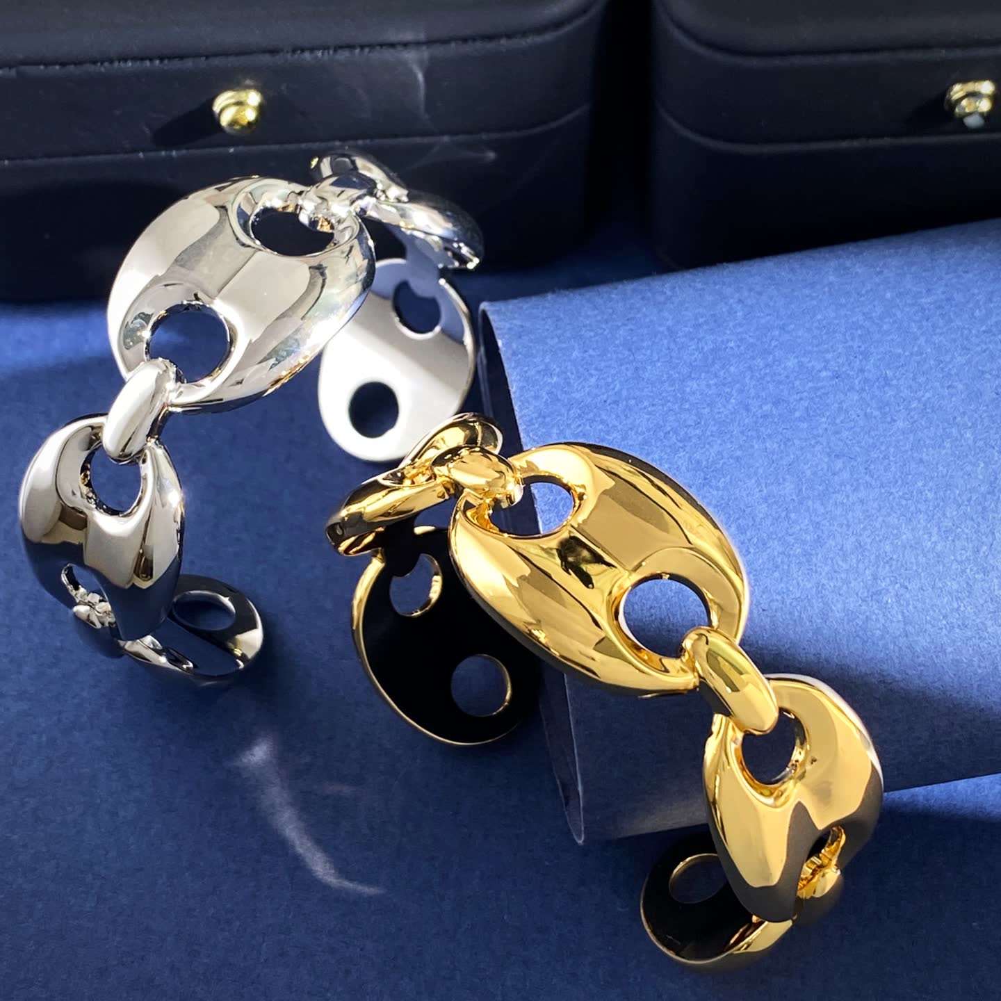 Gucci Elegant Gold and Silver Bracelets with Blue Stones