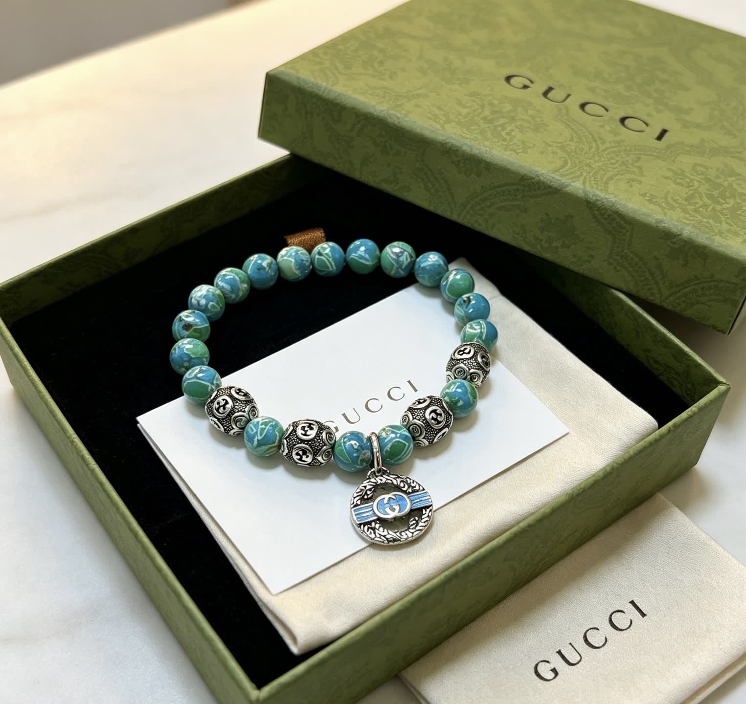 Gucci Blue Beaded Bracelet with Silver Charms