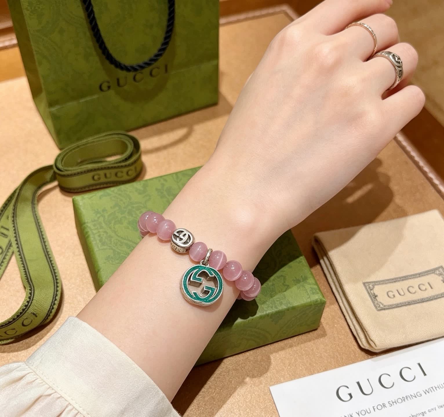 Gucci Pink Cat's Eye Bead Bracelet with Interlocking G Charm