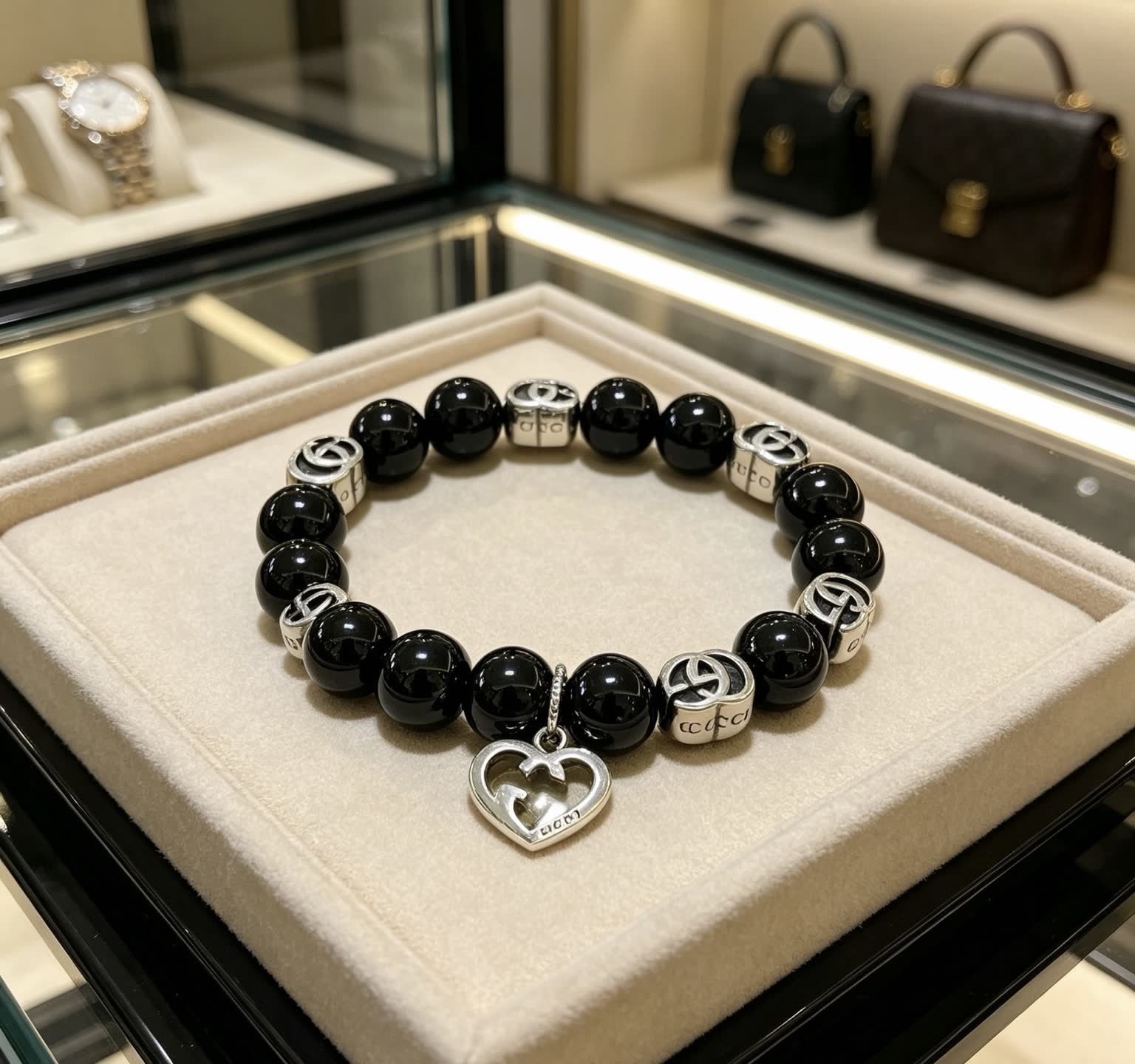 Gucci Black Bead Bracelet with Heart Charm