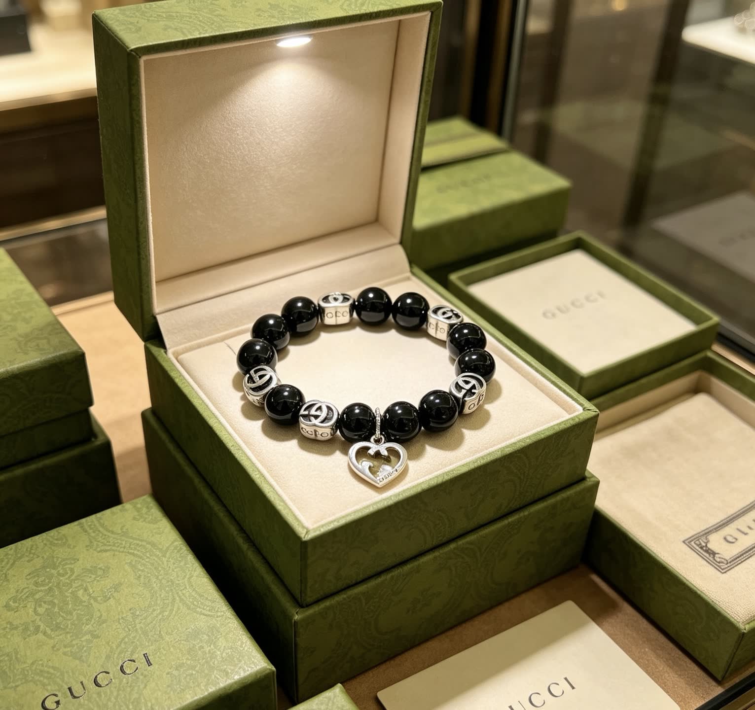 Gucci Black Bead Bracelet with Heart Charm