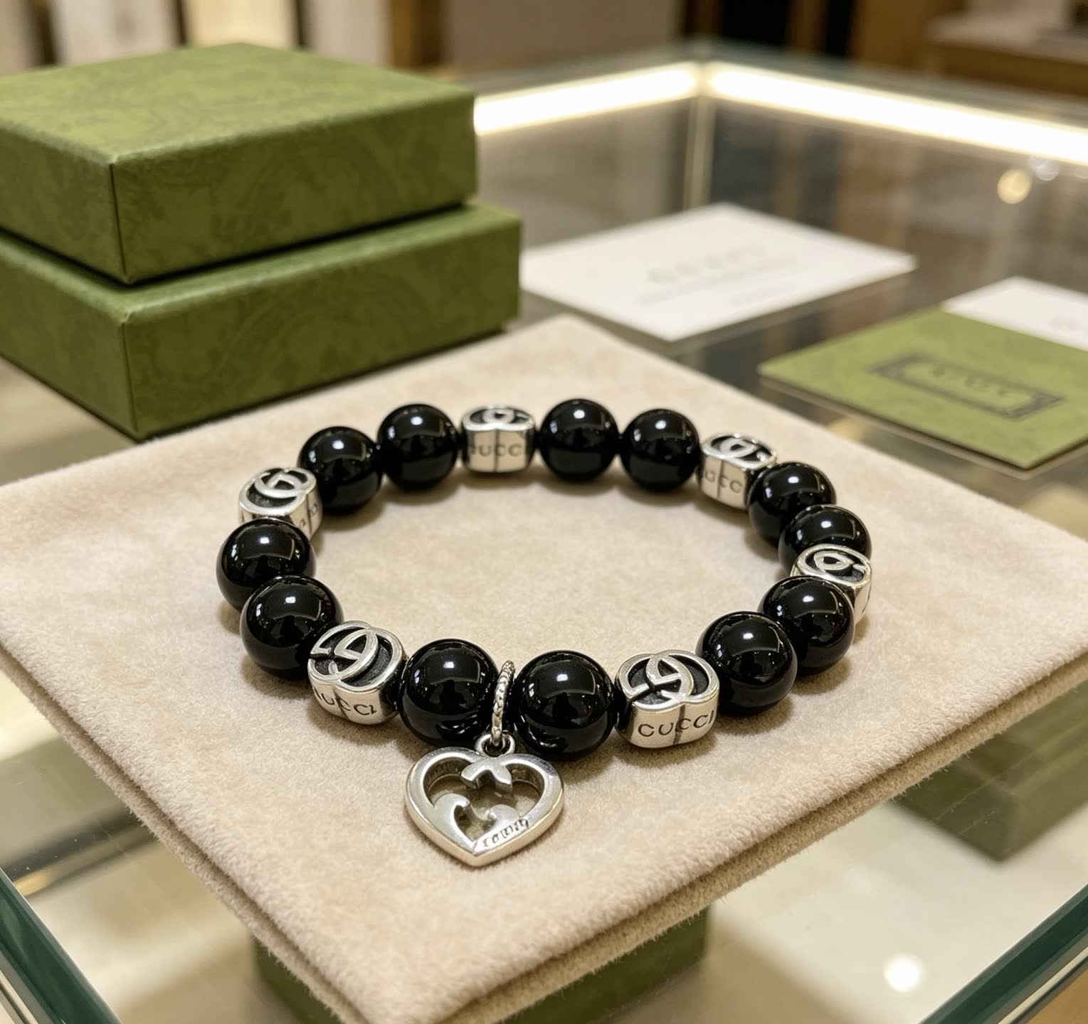 Gucci Black Bead Bracelet with Heart Charm