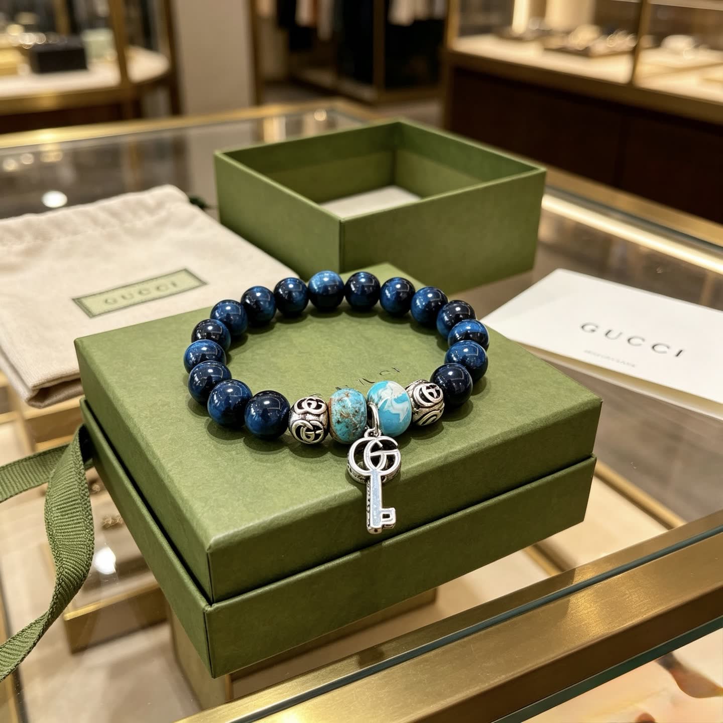 Gucci Blue Beaded Bracelet with Key Charm