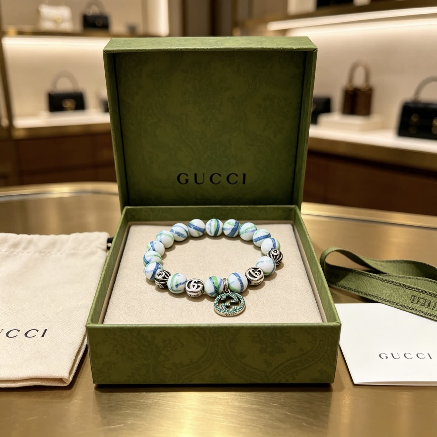 Gucci Marble Bead Bracelet with Interlocking G Charm