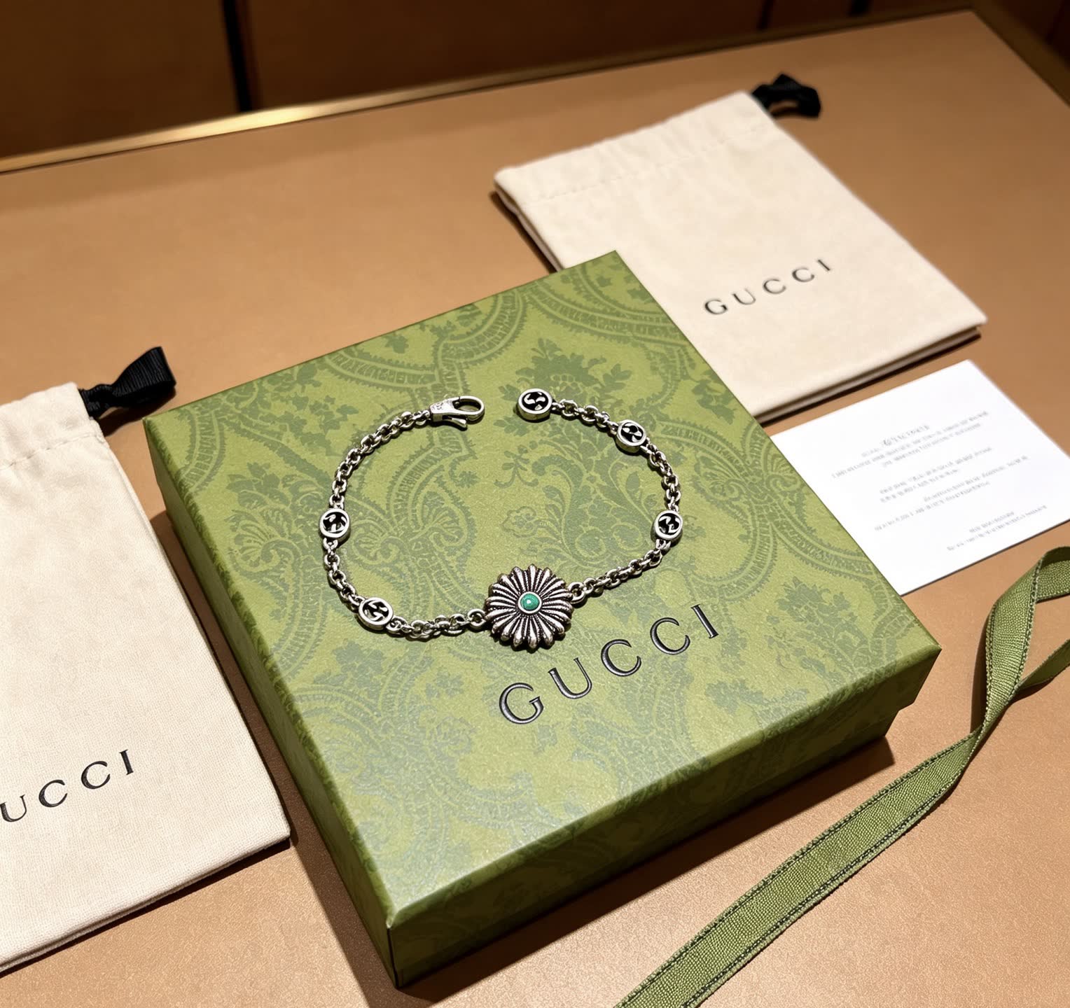 Gucci Silver Bracelet with Green Stone Gucci Silver Bracelet with Green Stone