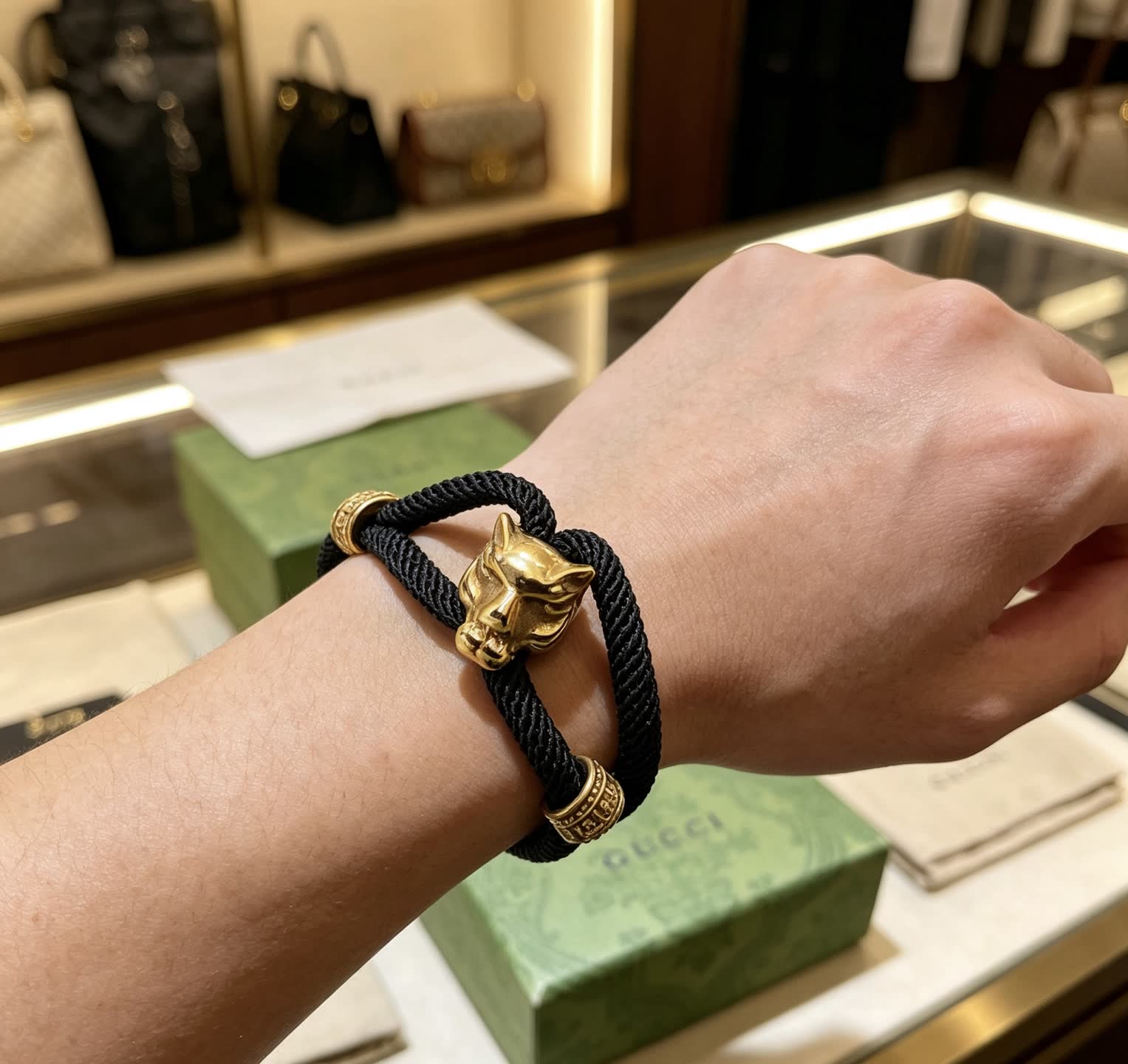 Gucci Black Rope Bracelet with Gold Panther Clasp