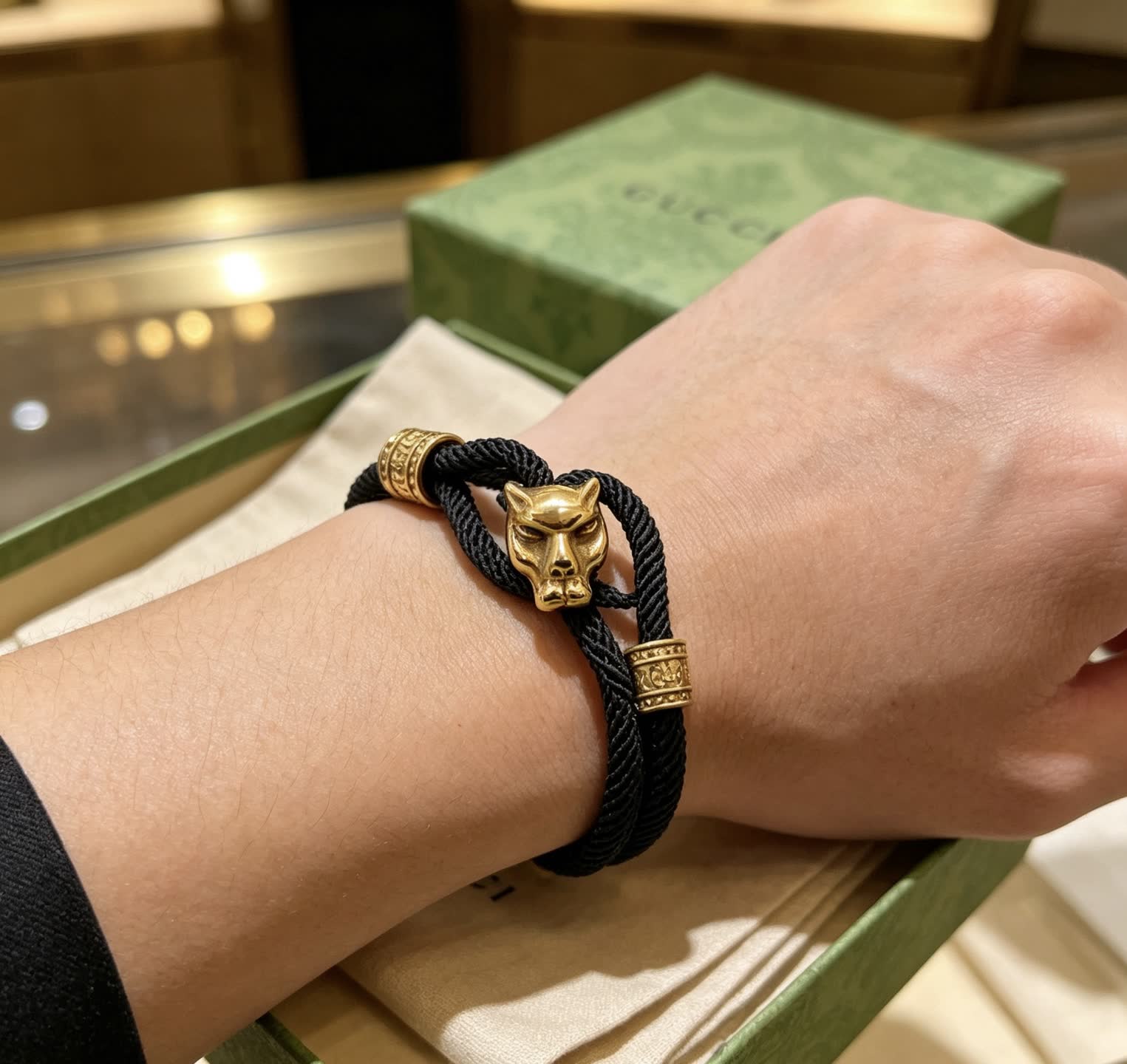 Gucci Black Rope Bracelet with Gold Panther Clasp