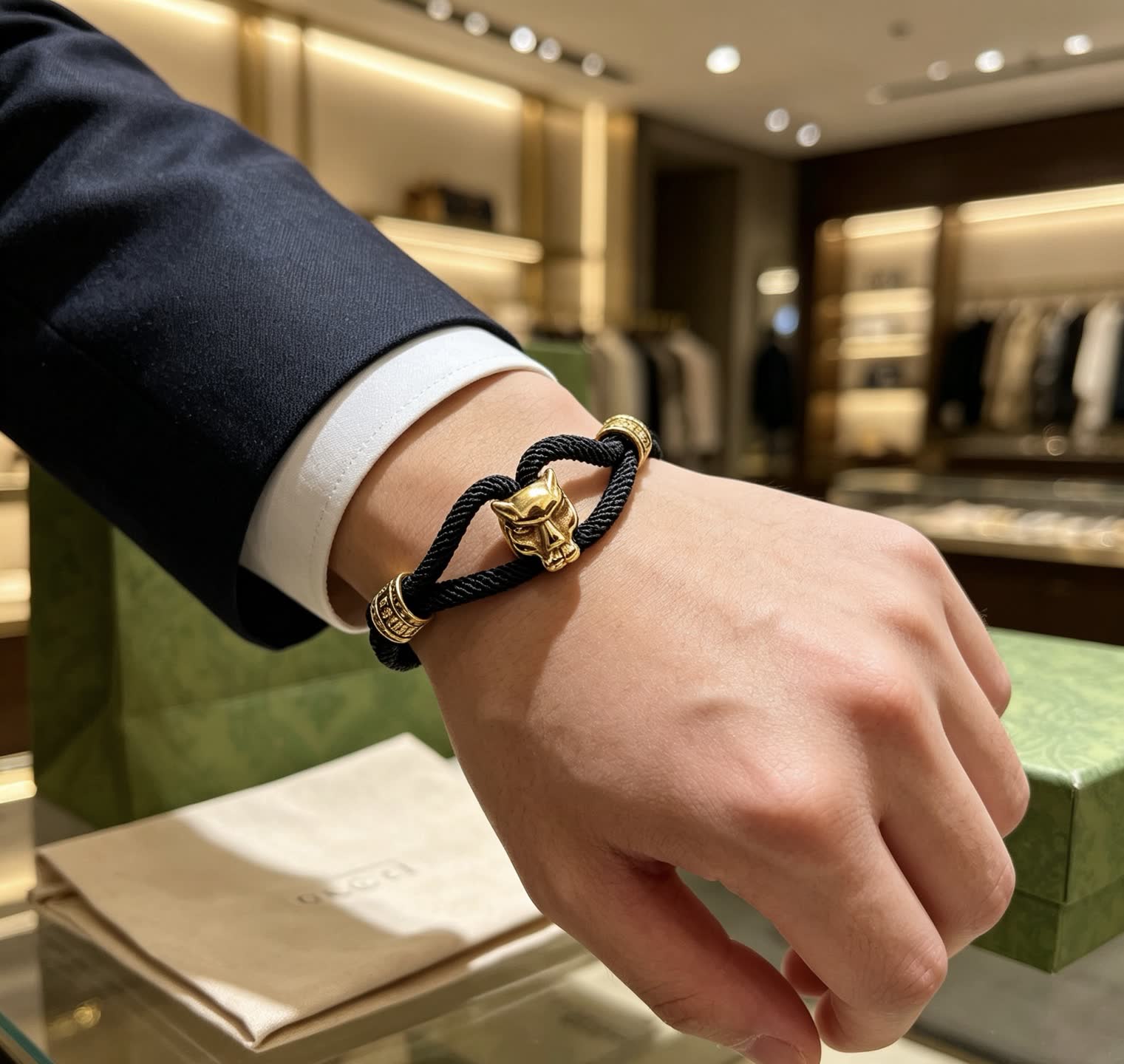 Gucci Black Rope Bracelet with Gold Panther Clasp