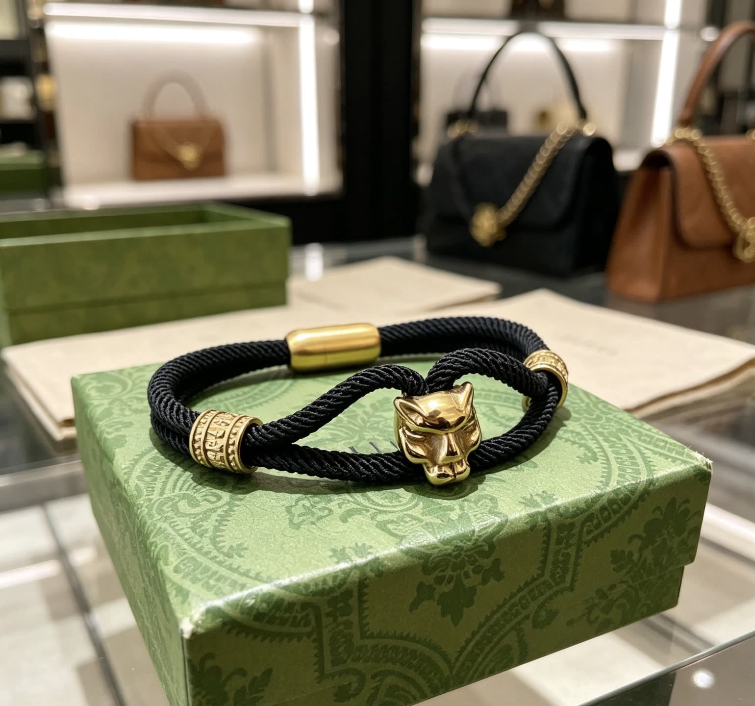 Gucci Black Rope Bracelet with Gold Panther Clasp