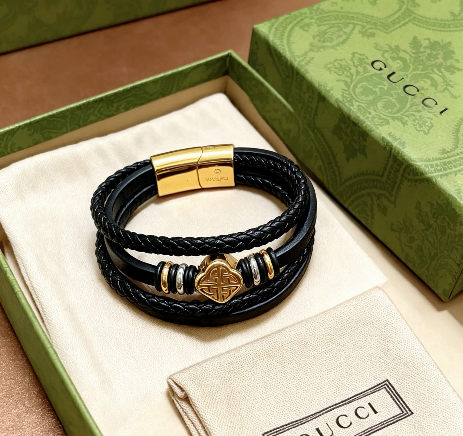 Gucci Black Braided Leather Bracelet with Gold Accents