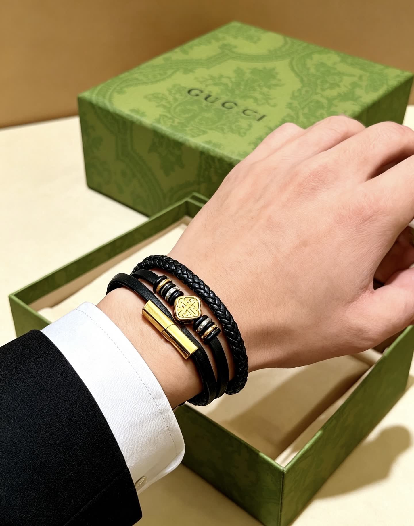 Gucci Black Braided Leather Bracelet with Gold Accents