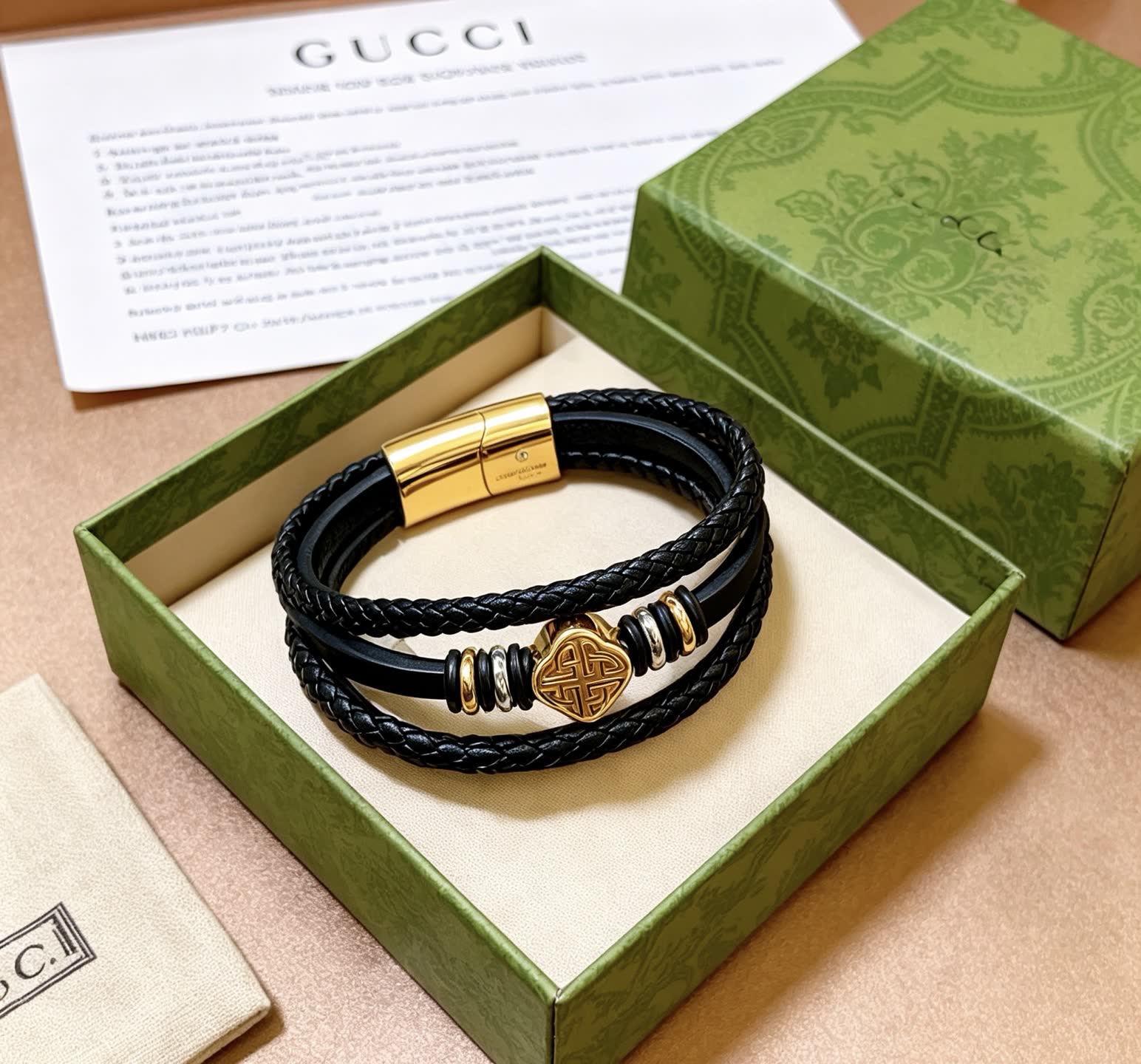 Gucci Black Braided Leather Bracelet with Gold Accents