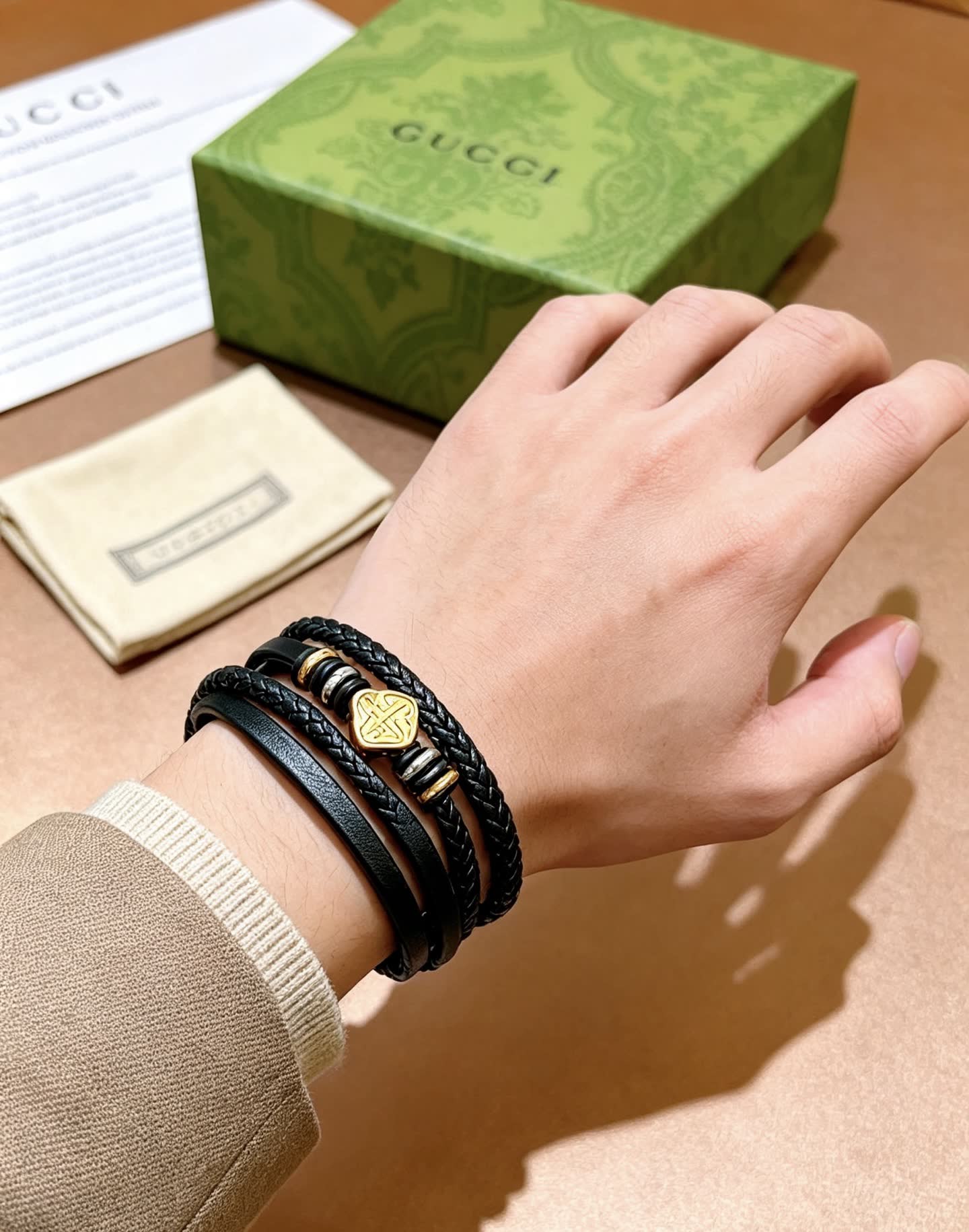 Gucci Black Braided Leather Bracelet with Gold Accents