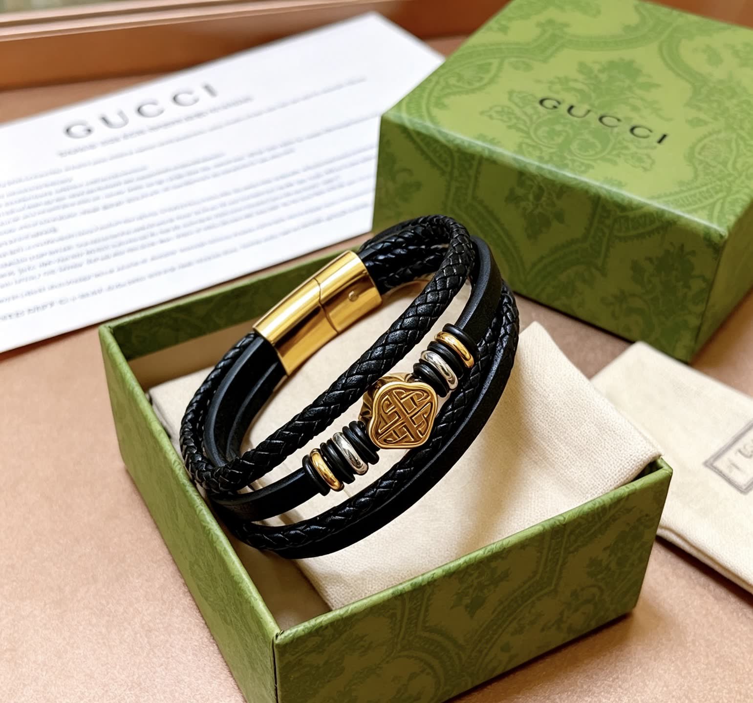 Gucci Black Braided Leather Bracelet with Gold Accents