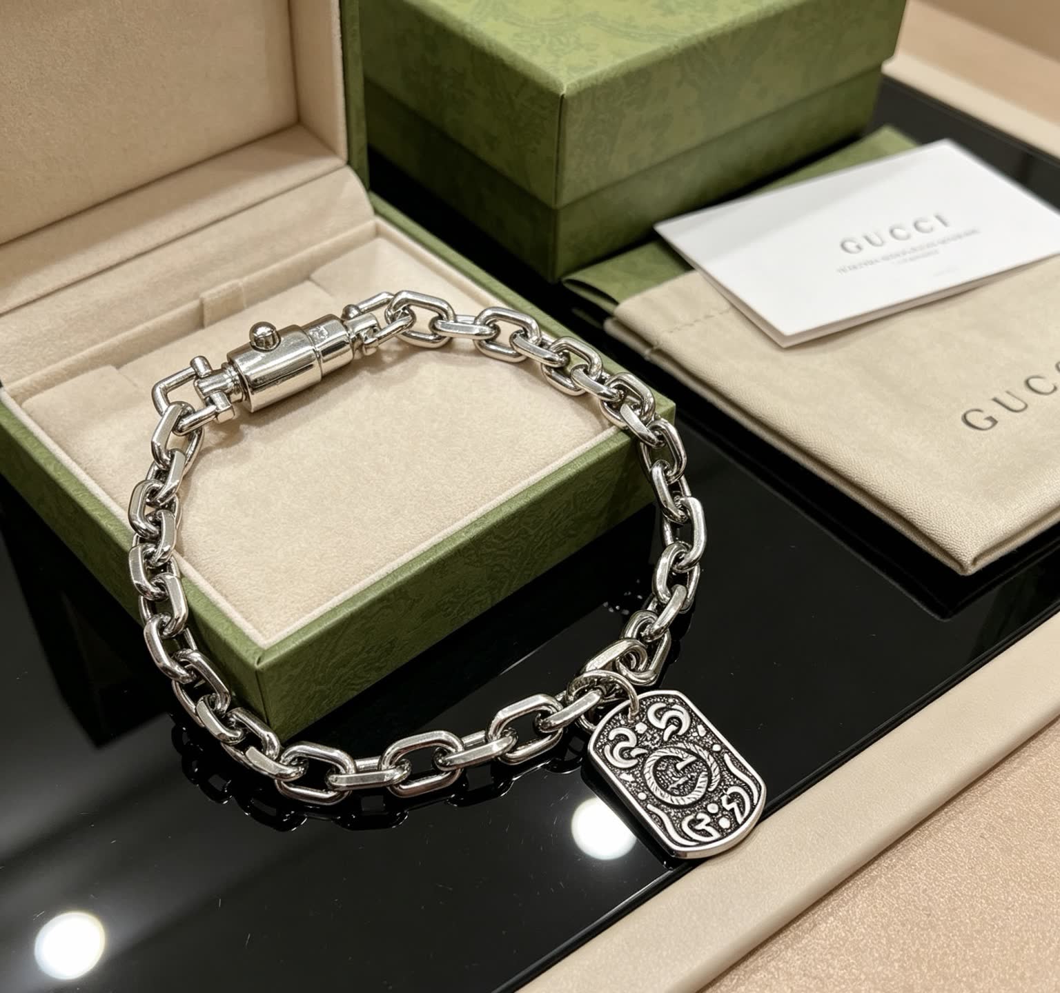Gucci Silver Chain Bracelet with Interlocking G Charm Gucci Silver Chain Bracelet with Interlocking G Charm