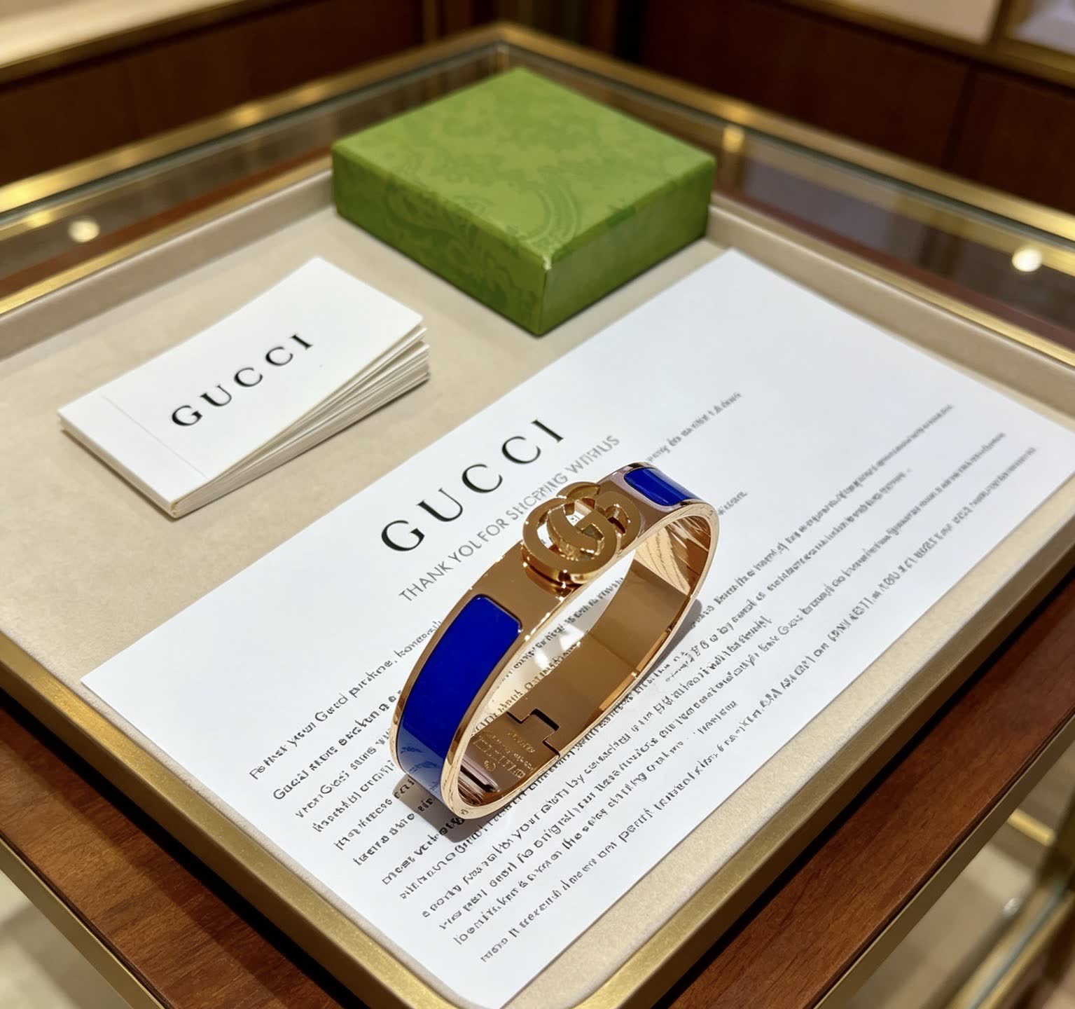 Gucci Blue Enamel Gold Tone Bangle Bracelet