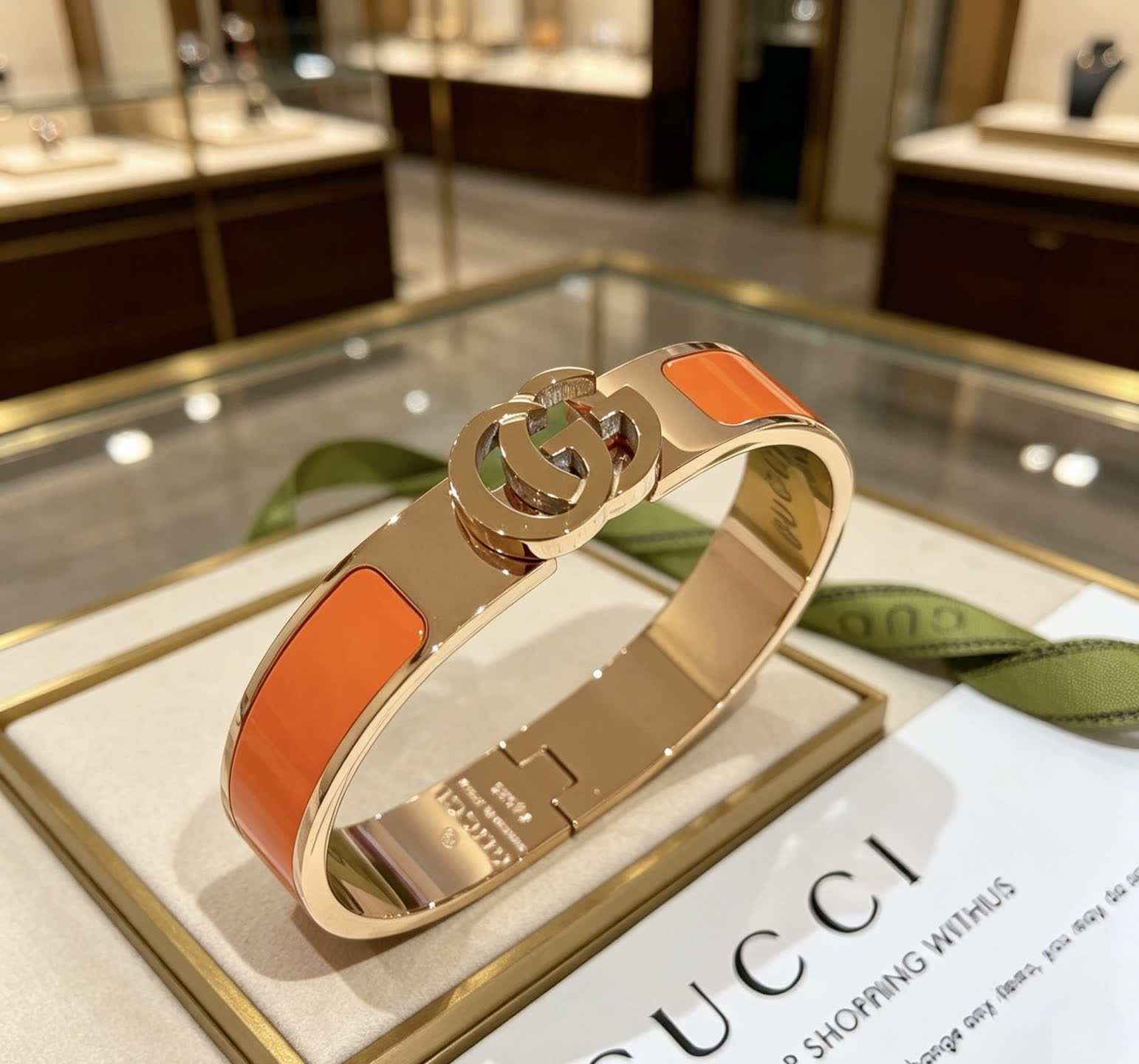 Gucci Gold and Orange Enamel Bangle Bracelet