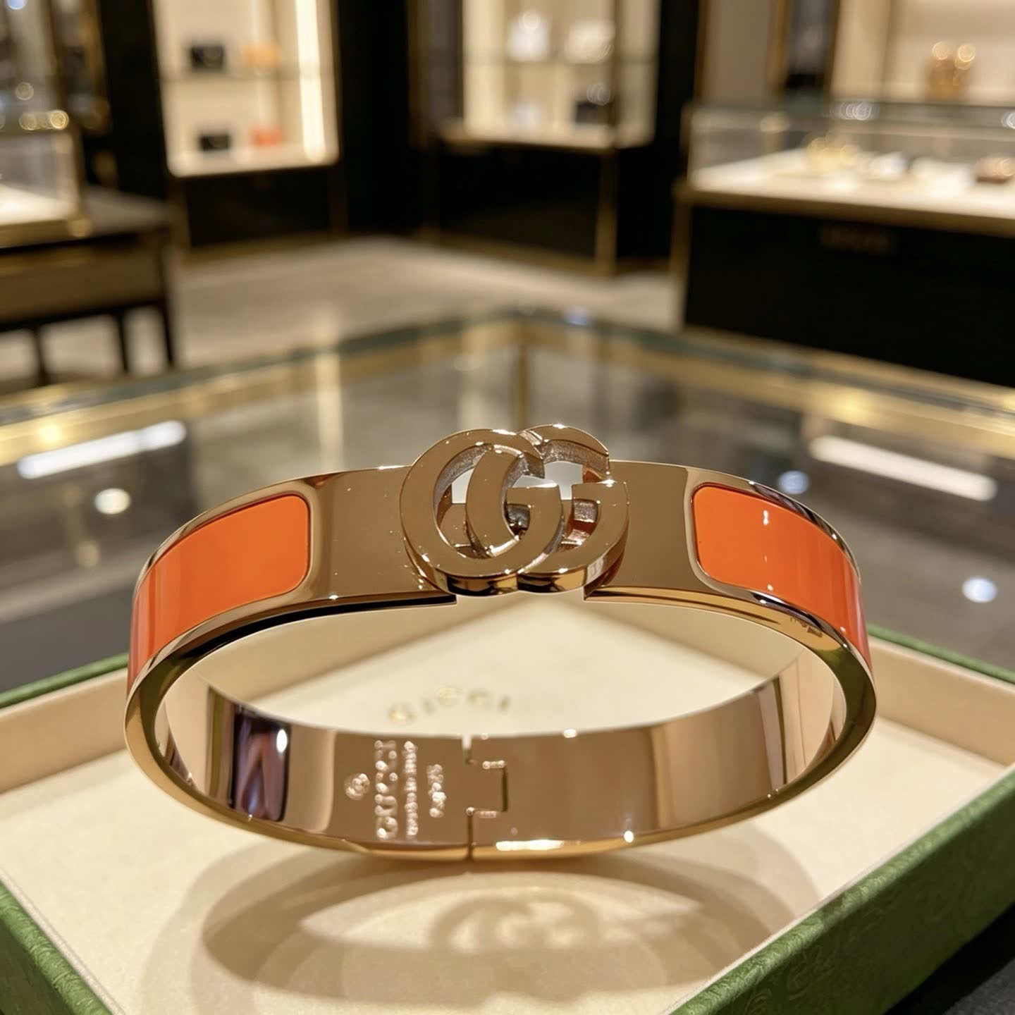 Gucci Gold and Orange Enamel Bangle Bracelet
