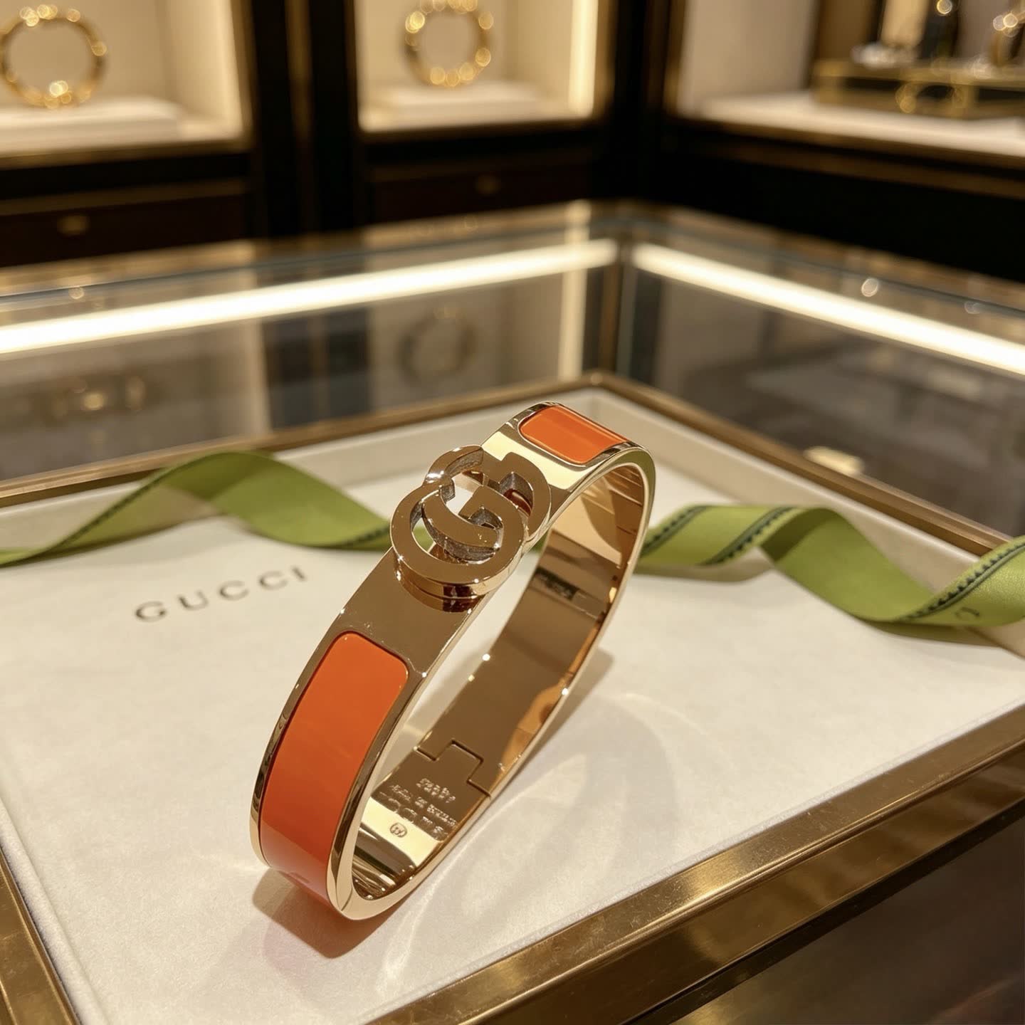 Gucci Gold and Orange Enamel Bangle Bracelet