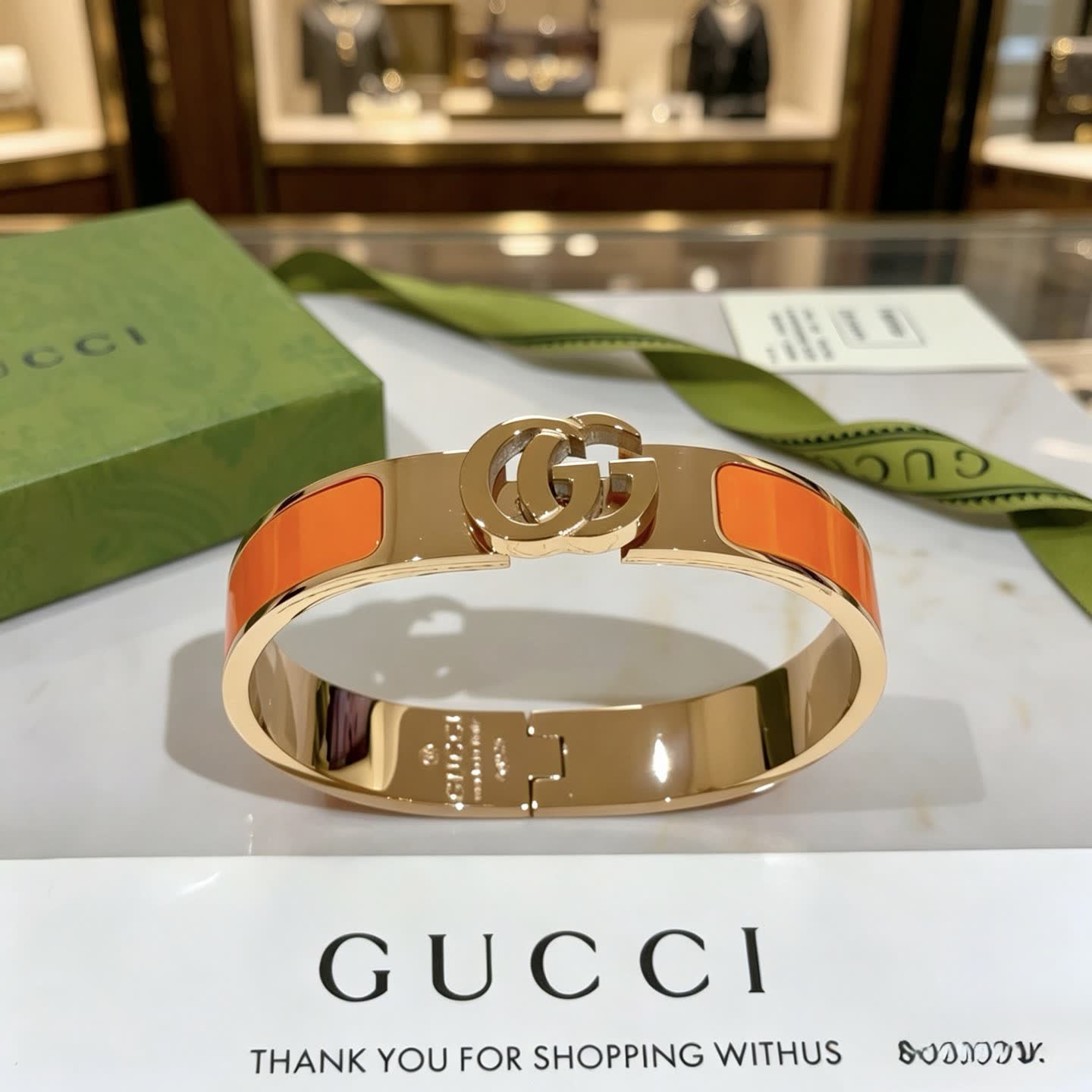 Gucci Gold and Orange Enamel Bangle Bracelet
