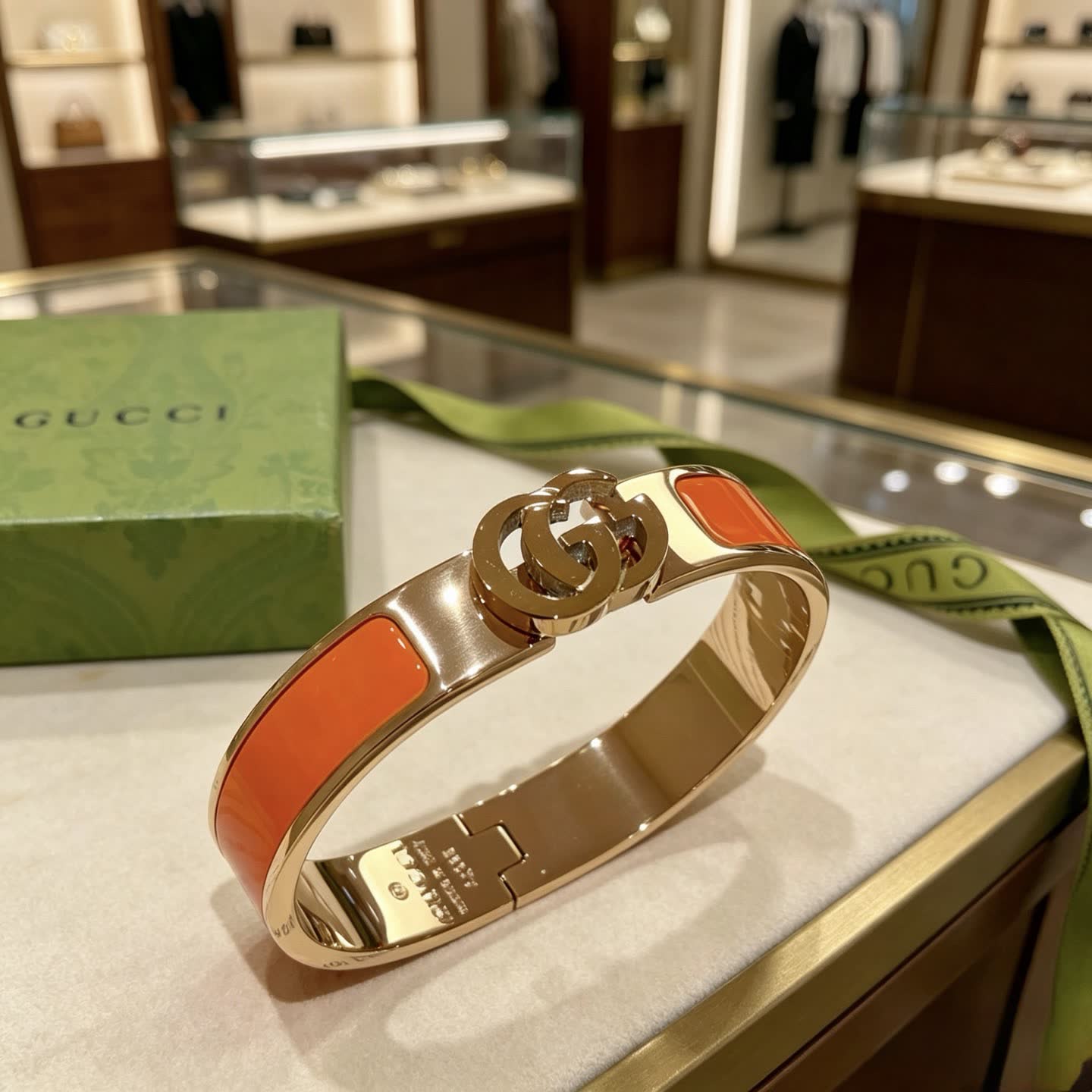 Gucci Gold and Orange Enamel Bangle Bracelet