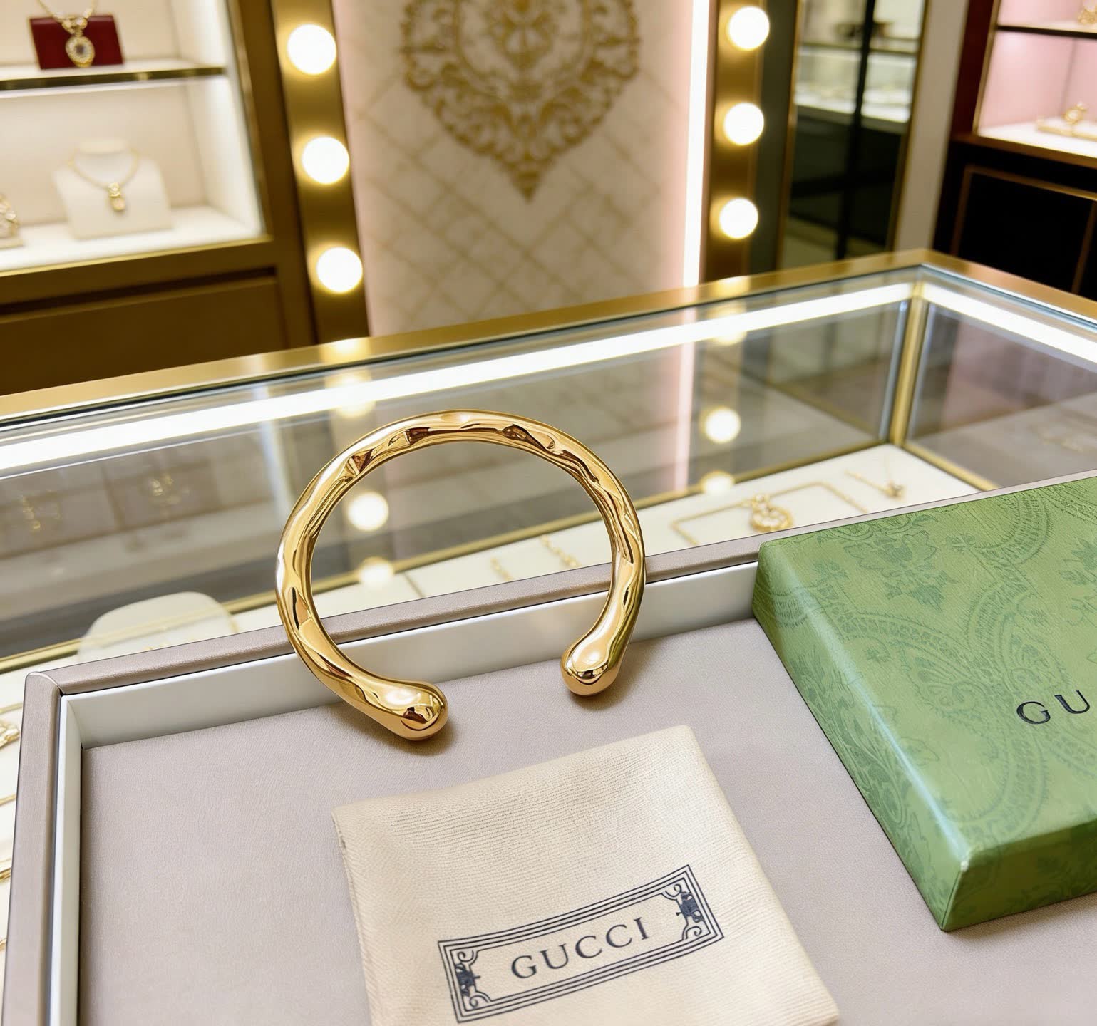 Gucci Gold Tone Snake Bracelet