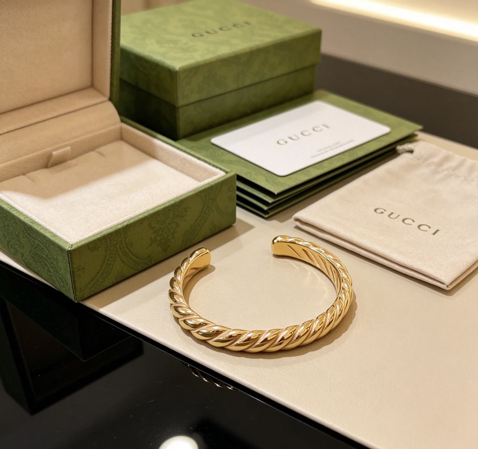 Gucci Gold Tone Twisted Cuff Bracelet Gucci Gold Tone Twisted Cuff Bracelet
