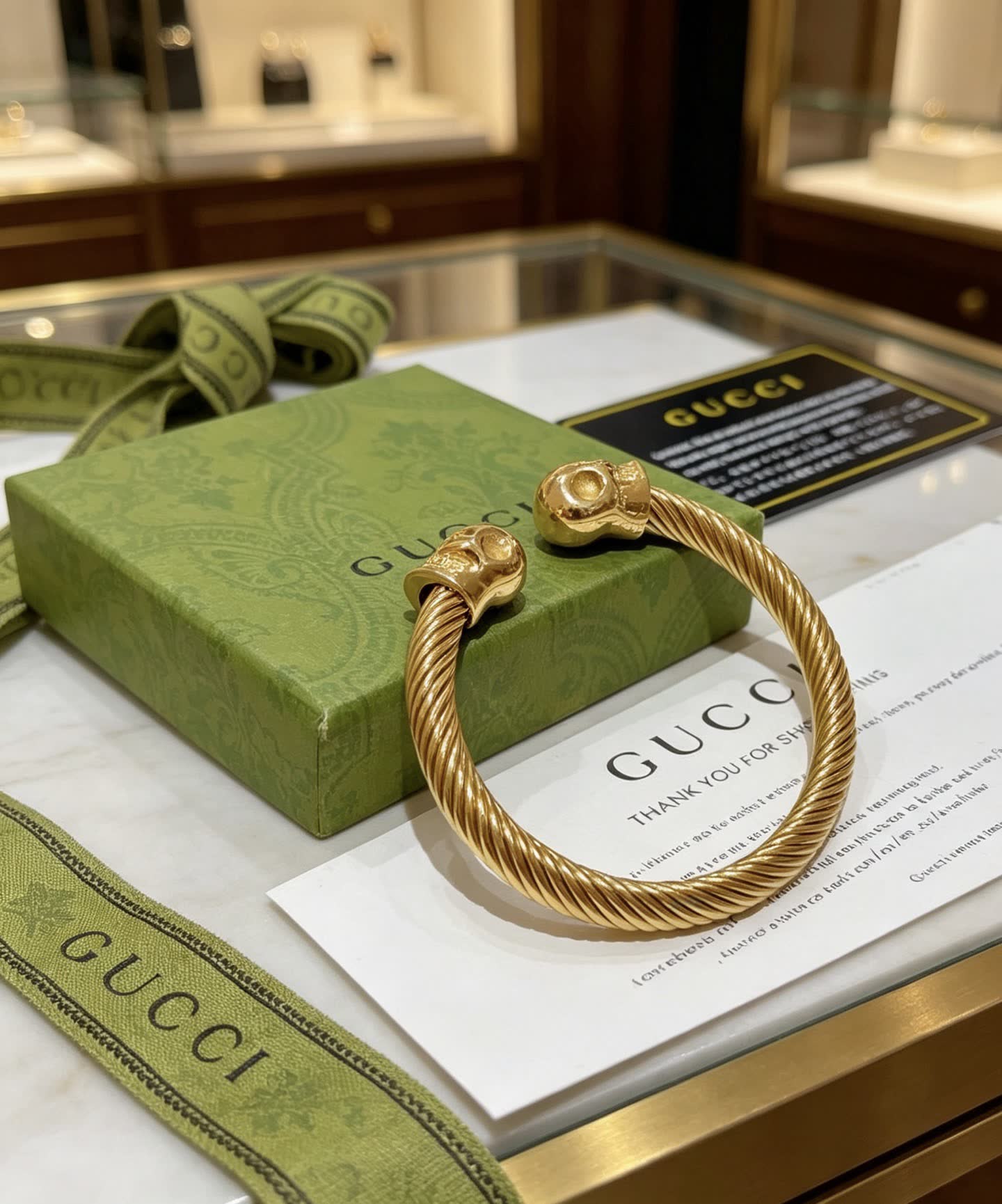 Gucci Gold Tone Skull Bracelet