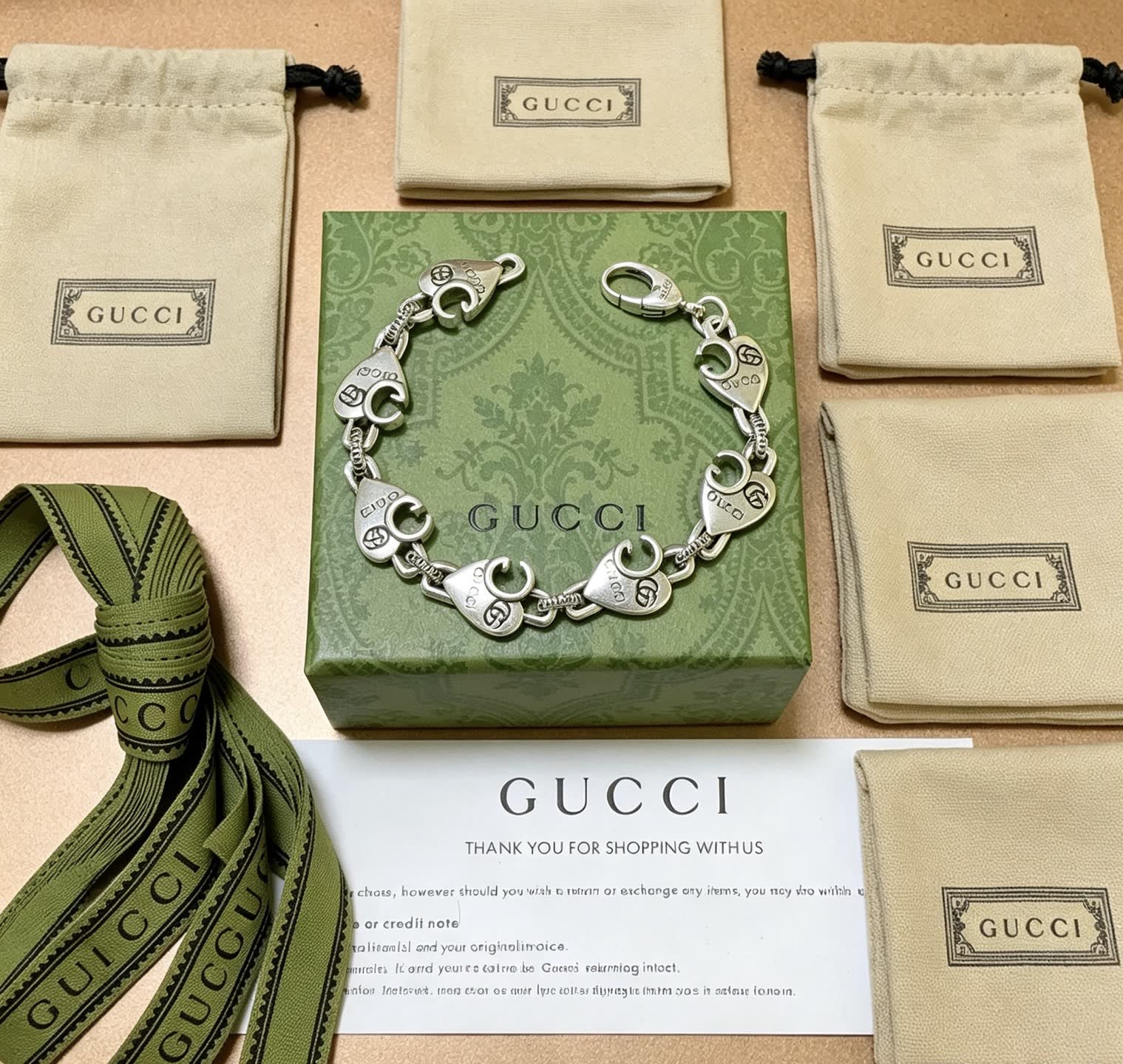 Gucci Silver Heart Link Bracelet