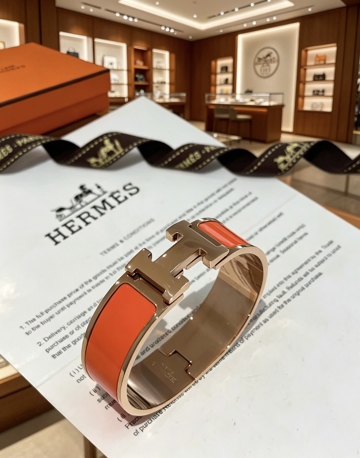 Hermes Hermès Orange and Gold H Bracelet