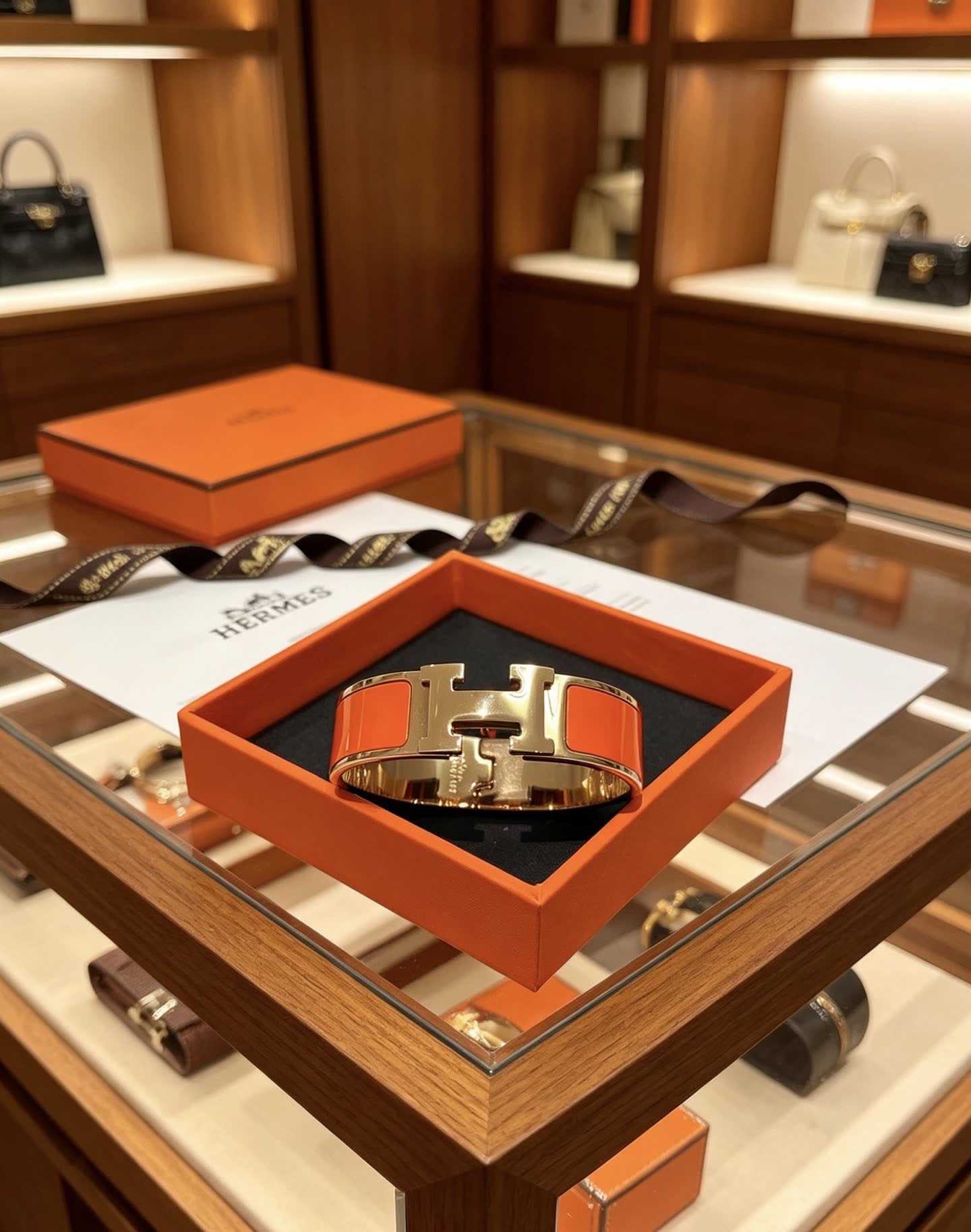 Hermes Hermès Orange and Gold H Bracelet