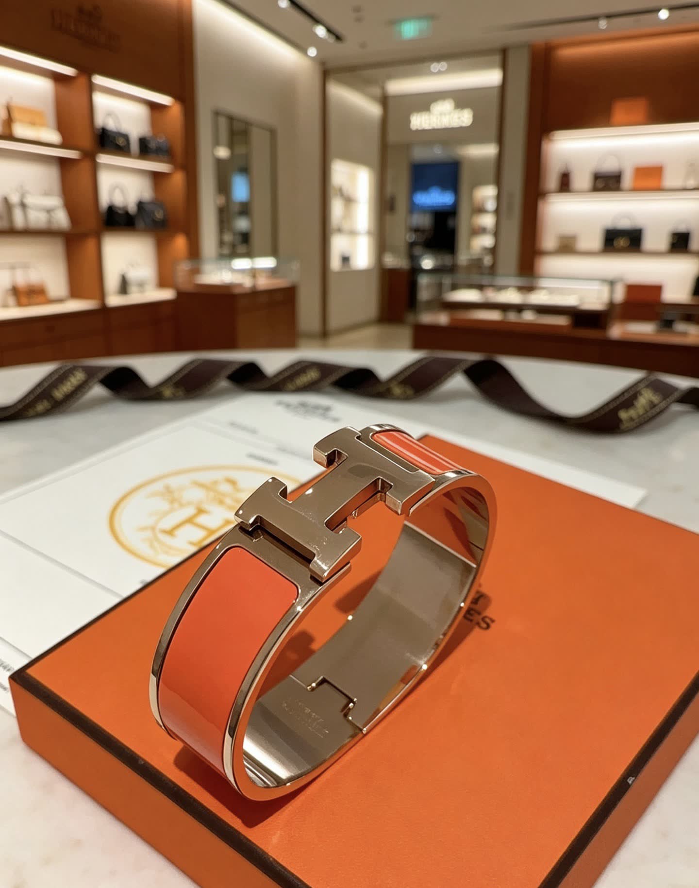 Hermes Hermès Orange and Gold H Bracelet