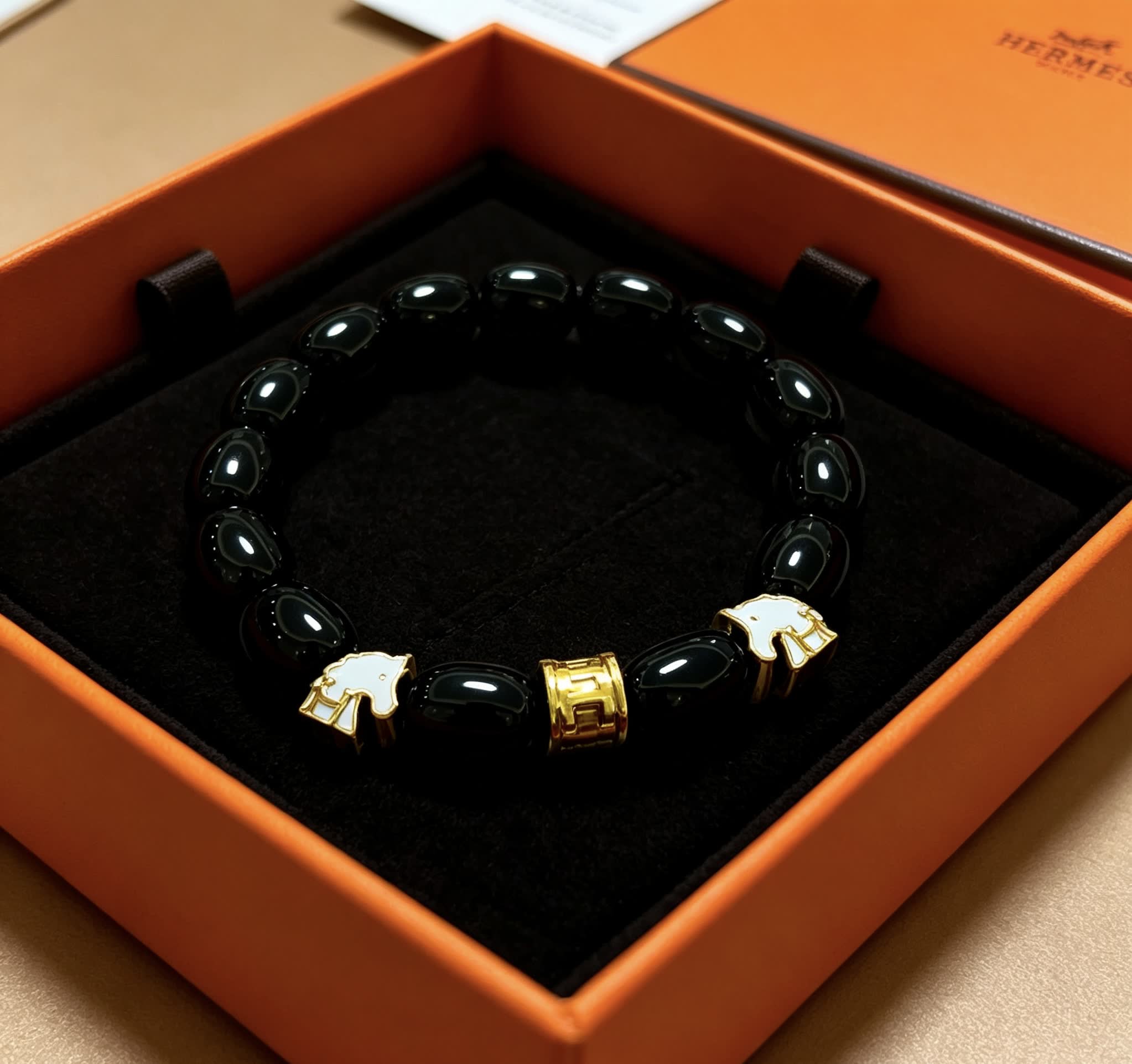 Hermes Hermès Black Beaded Bracelet with Gold Accents Hermes Hermès Black Beaded Bracelet with Gold Accents