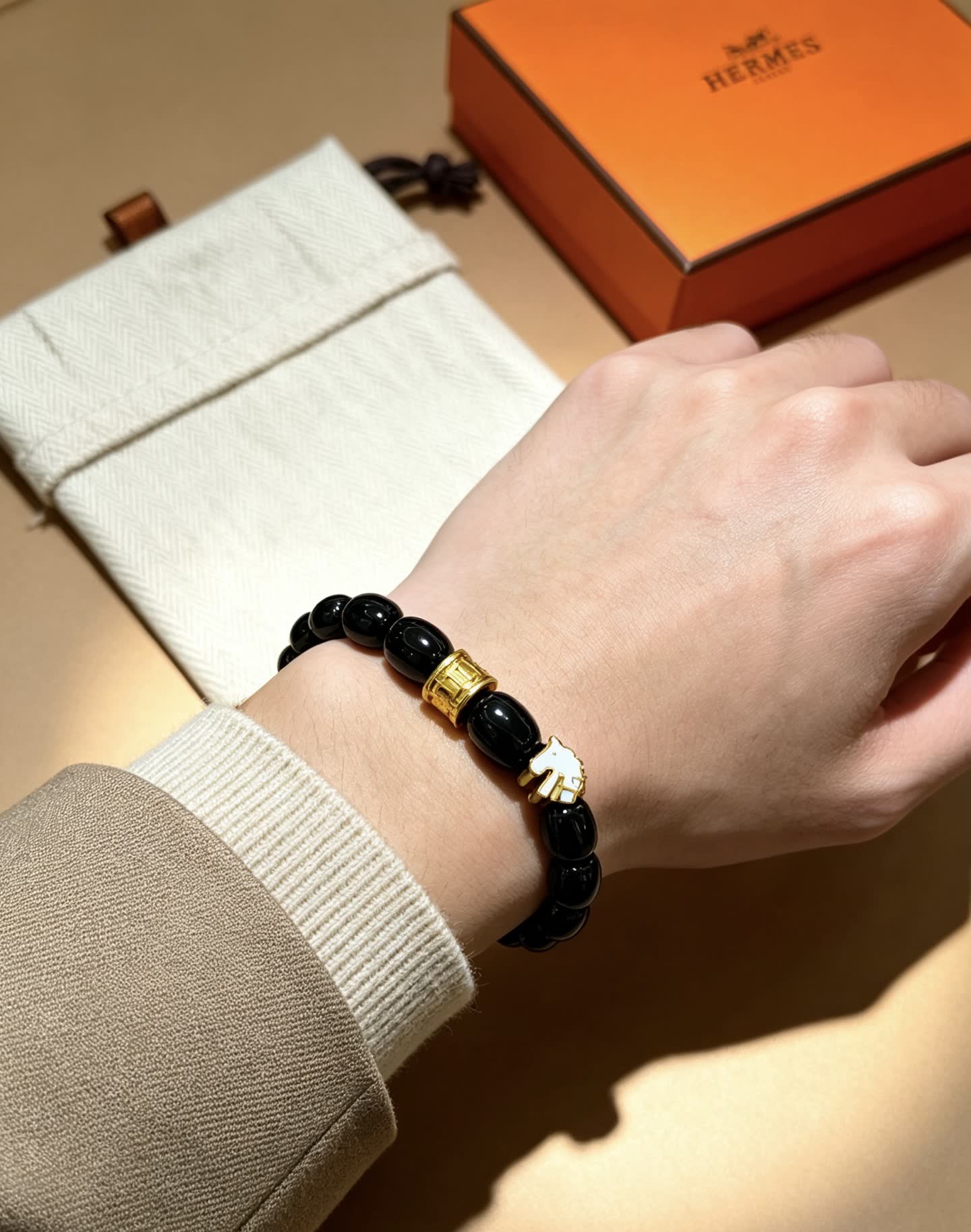 Hermes Hermès Black Beaded Bracelet with Gold Accents