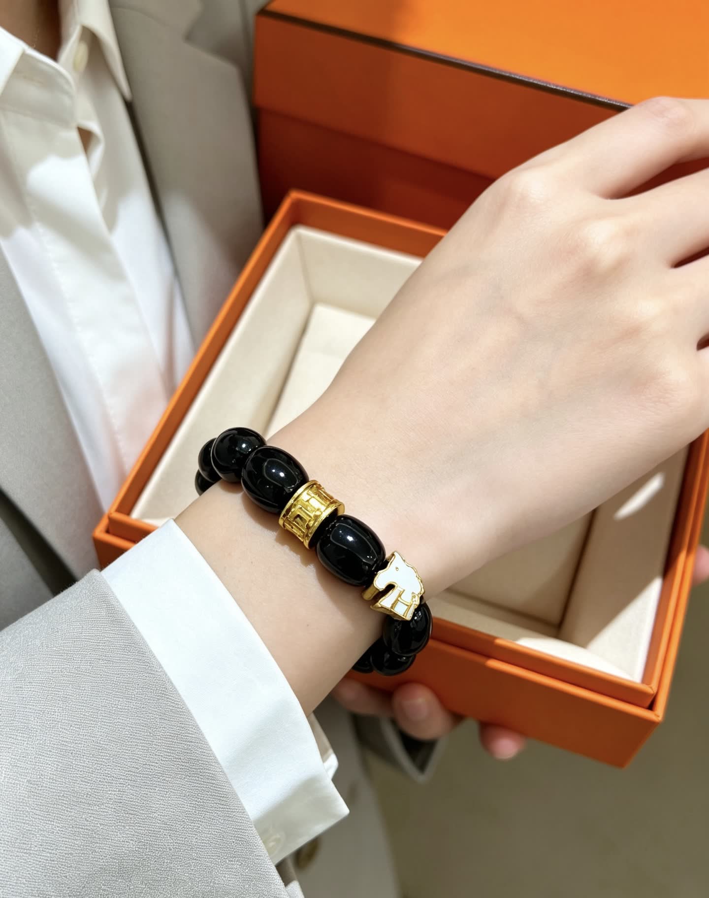 Hermes Hermès Black Beaded Bracelet with Gold Accents