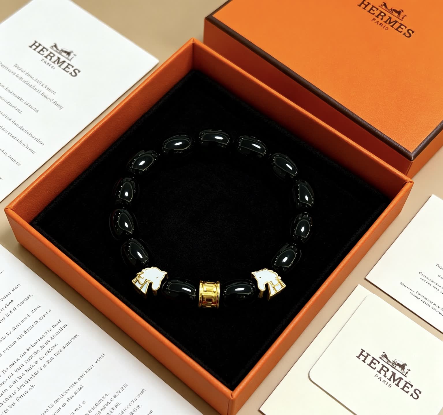 Hermes Hermès Black Beaded Bracelet with Gold Accents