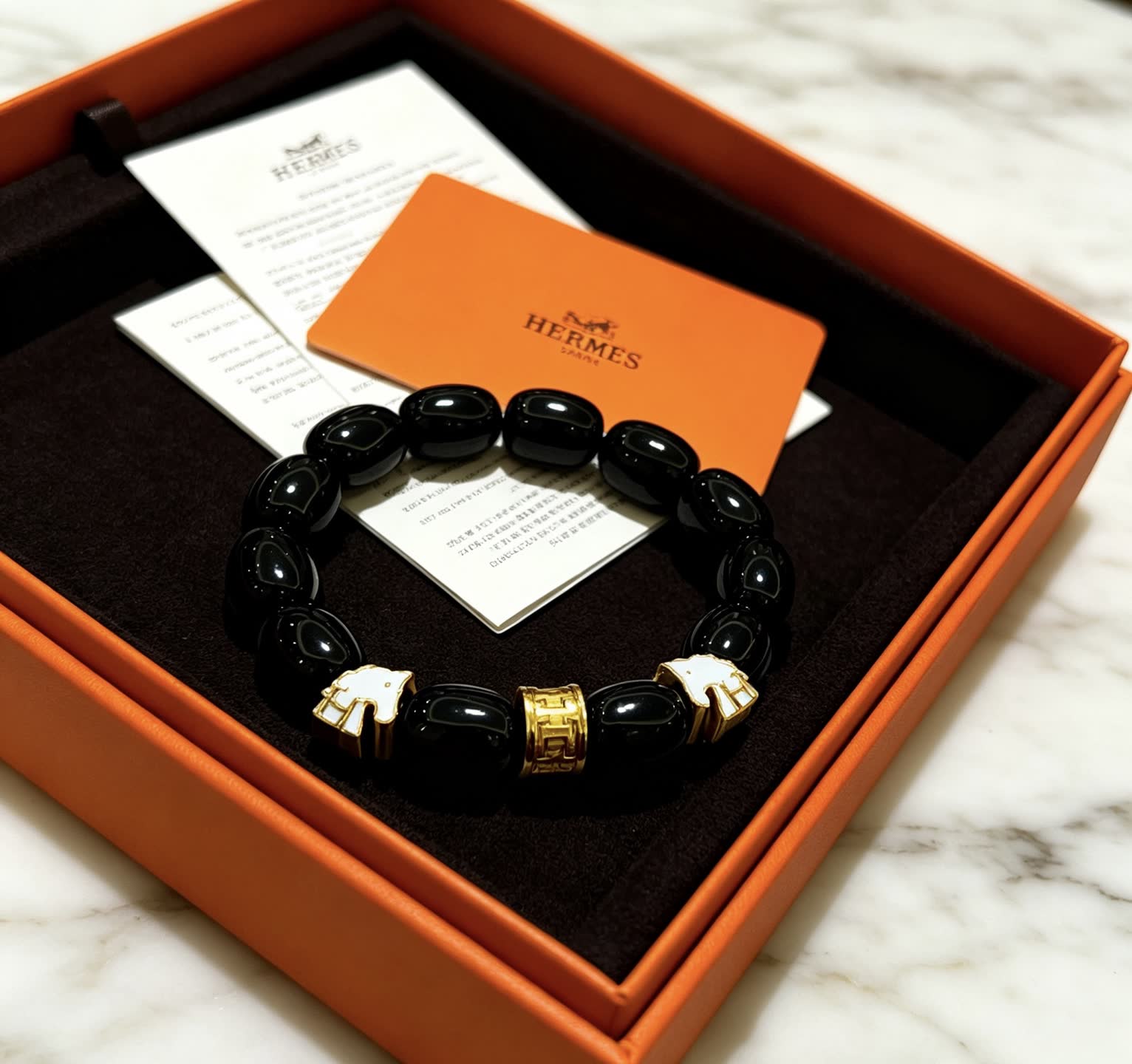 Hermes Hermès Black Beaded Bracelet with Gold Accents