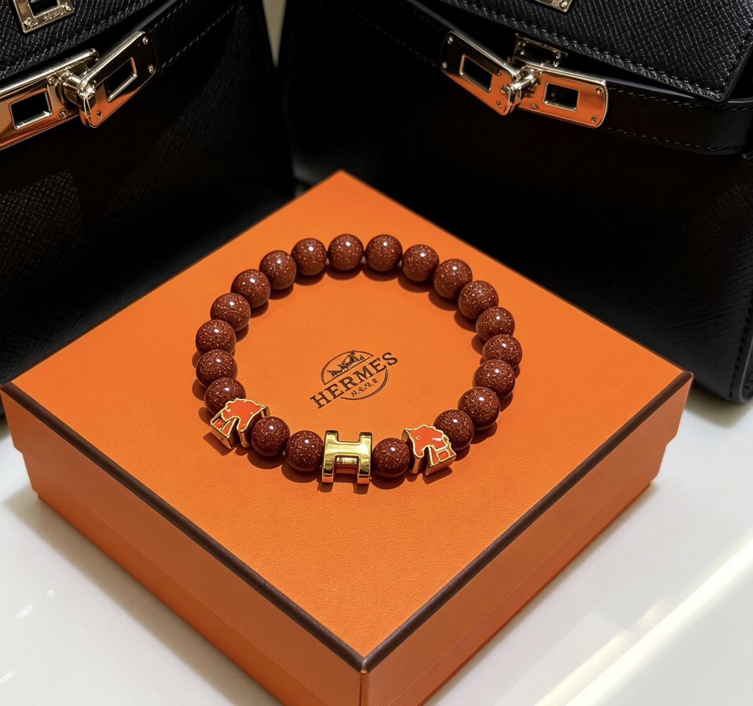 Hermes Hermès Brown Glitter Bead Bracelet with Gold Horseshoe Charms