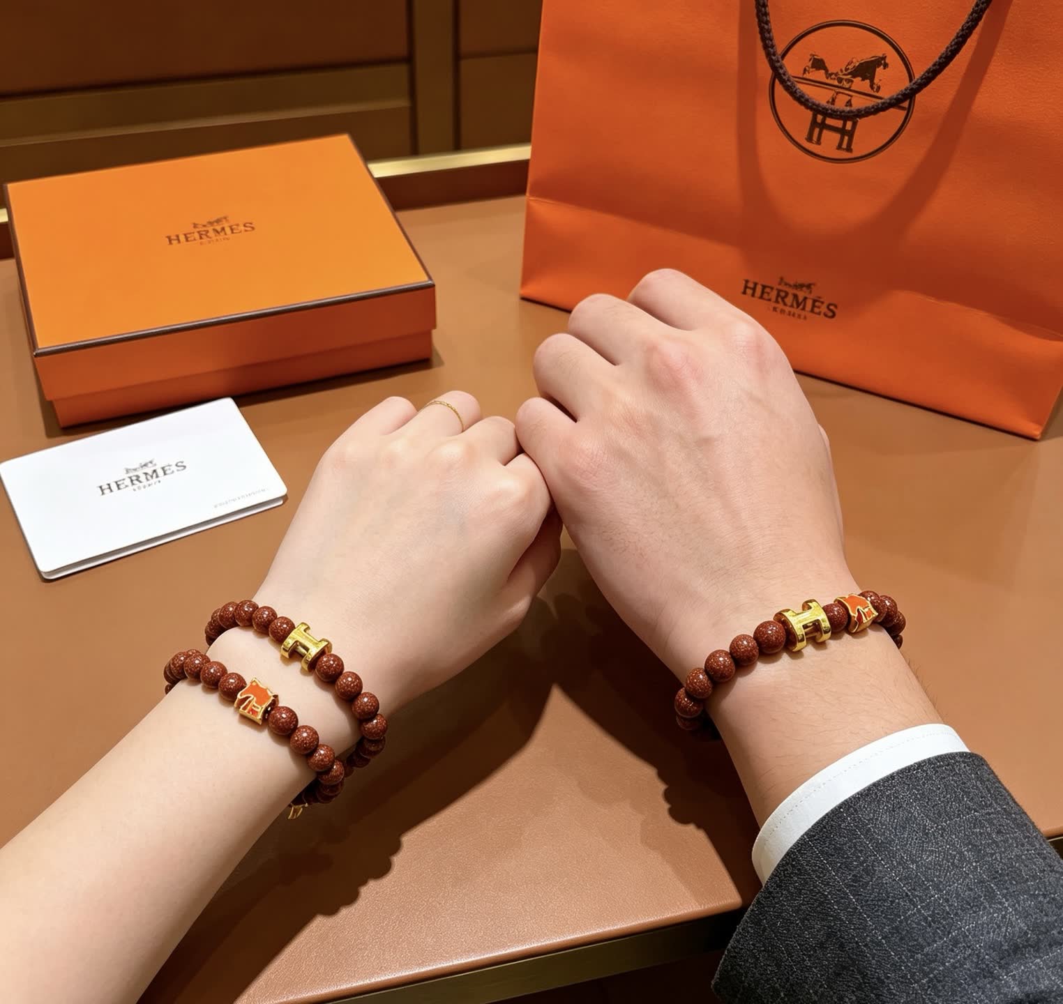 Hermes Hermès Brown Glitter Bead Bracelet with Gold Horseshoe Charms