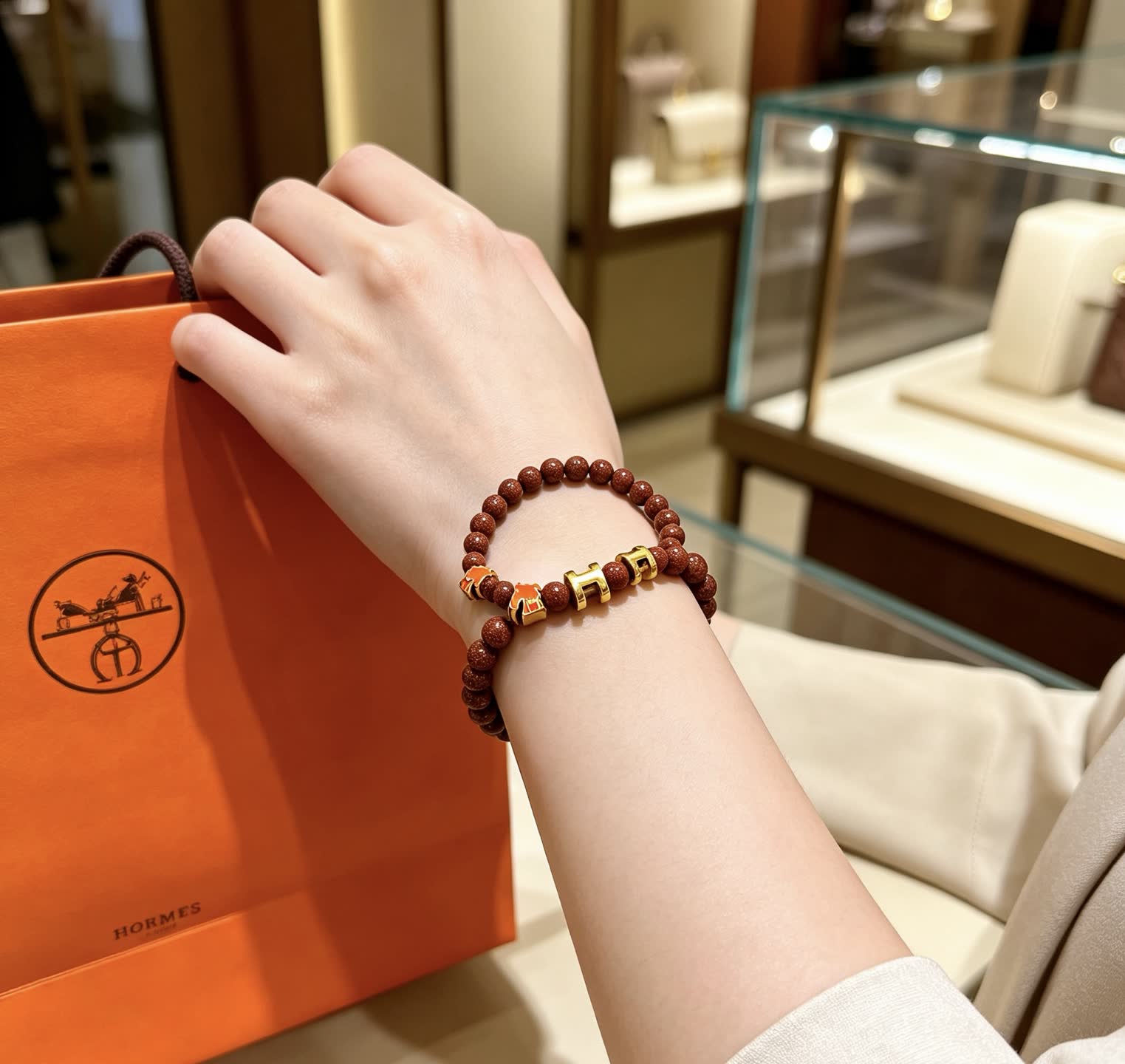 Hermes Hermès Brown Glitter Bead Bracelet with Gold Horseshoe Charms