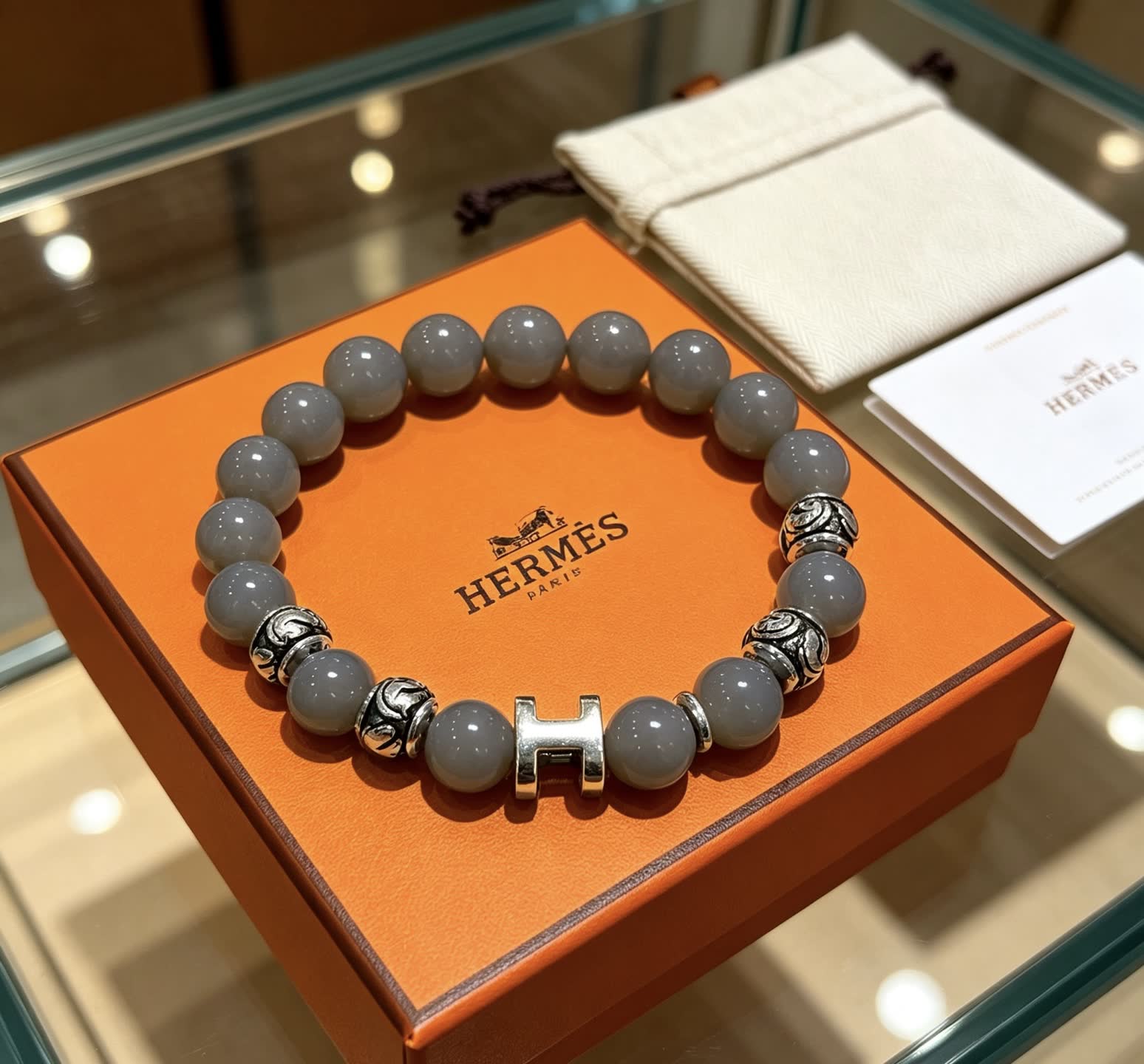 Hermes Hermès Paris Grey Beaded Bracelet with Silver H-Bead Hermes Hermès Paris Grey Beaded Bracelet with Silver H-Bead